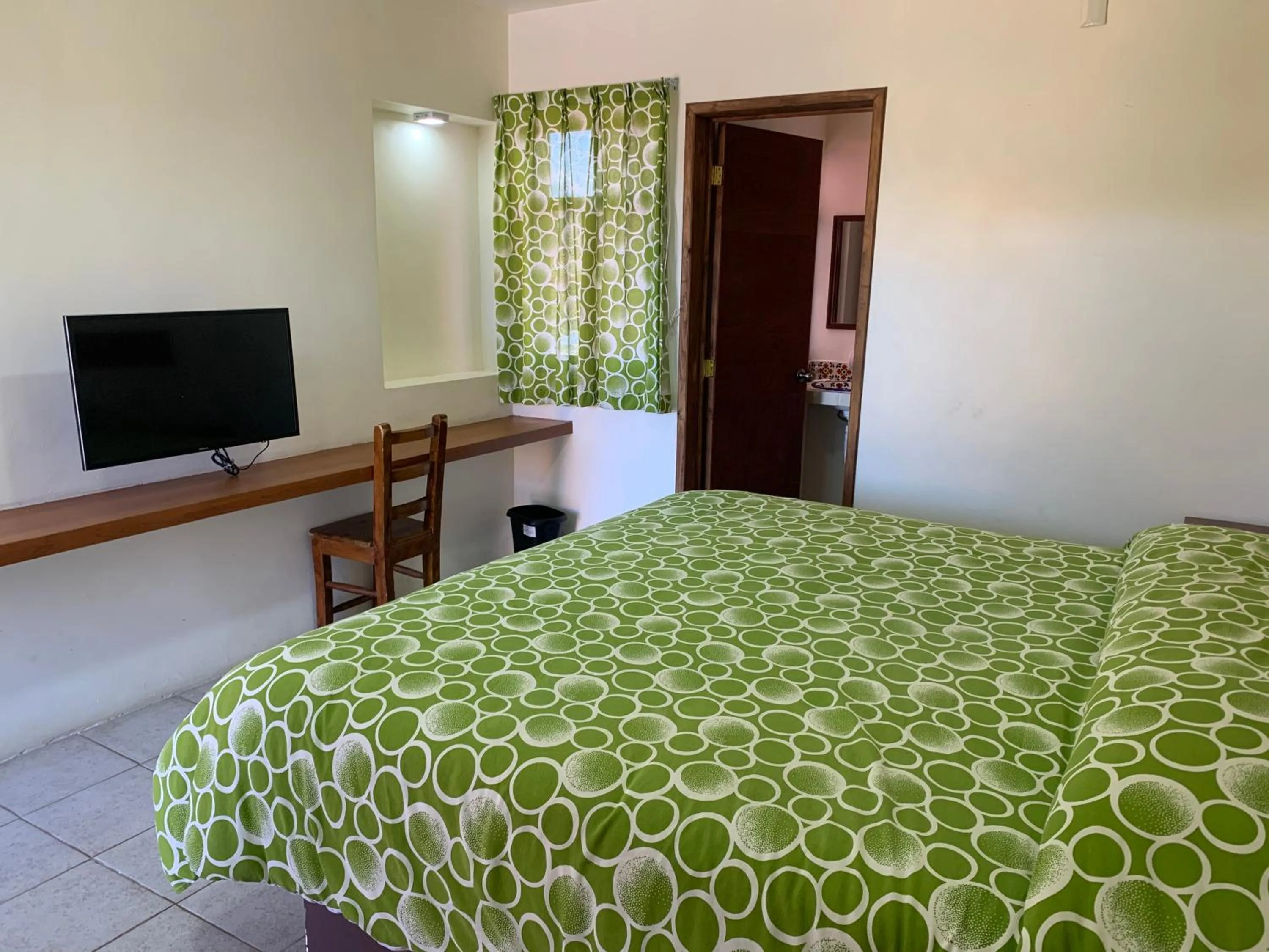 Bed in Hotel Posada Don Ramon