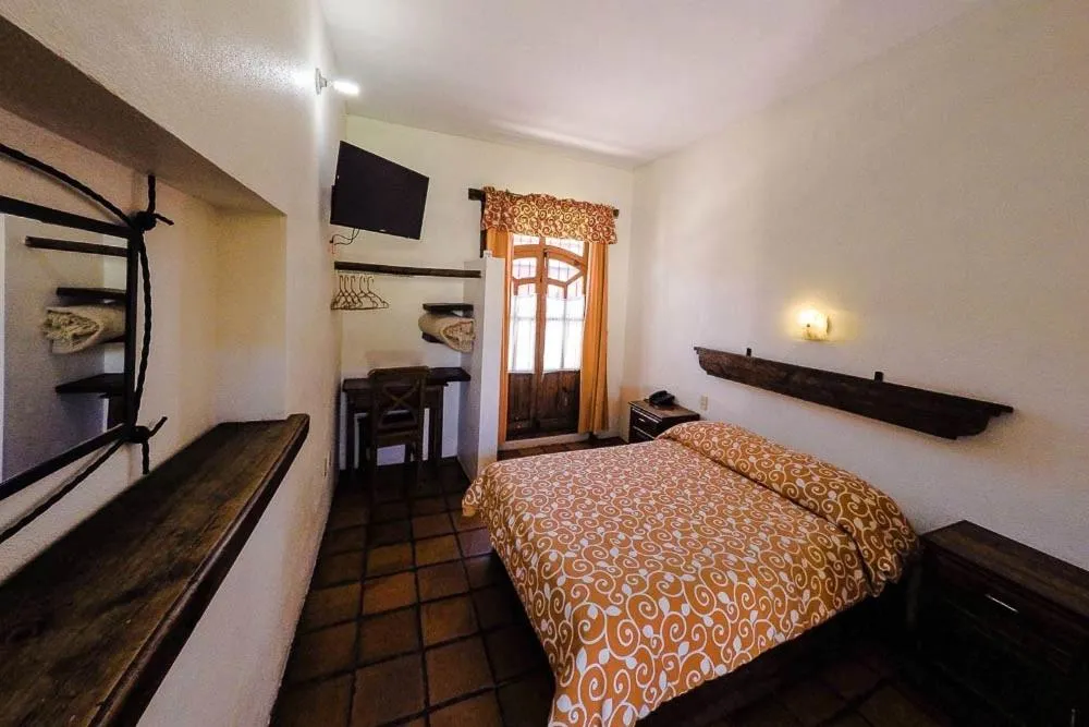 View (from property/room), Bed in Hotel Posada Don Ramon