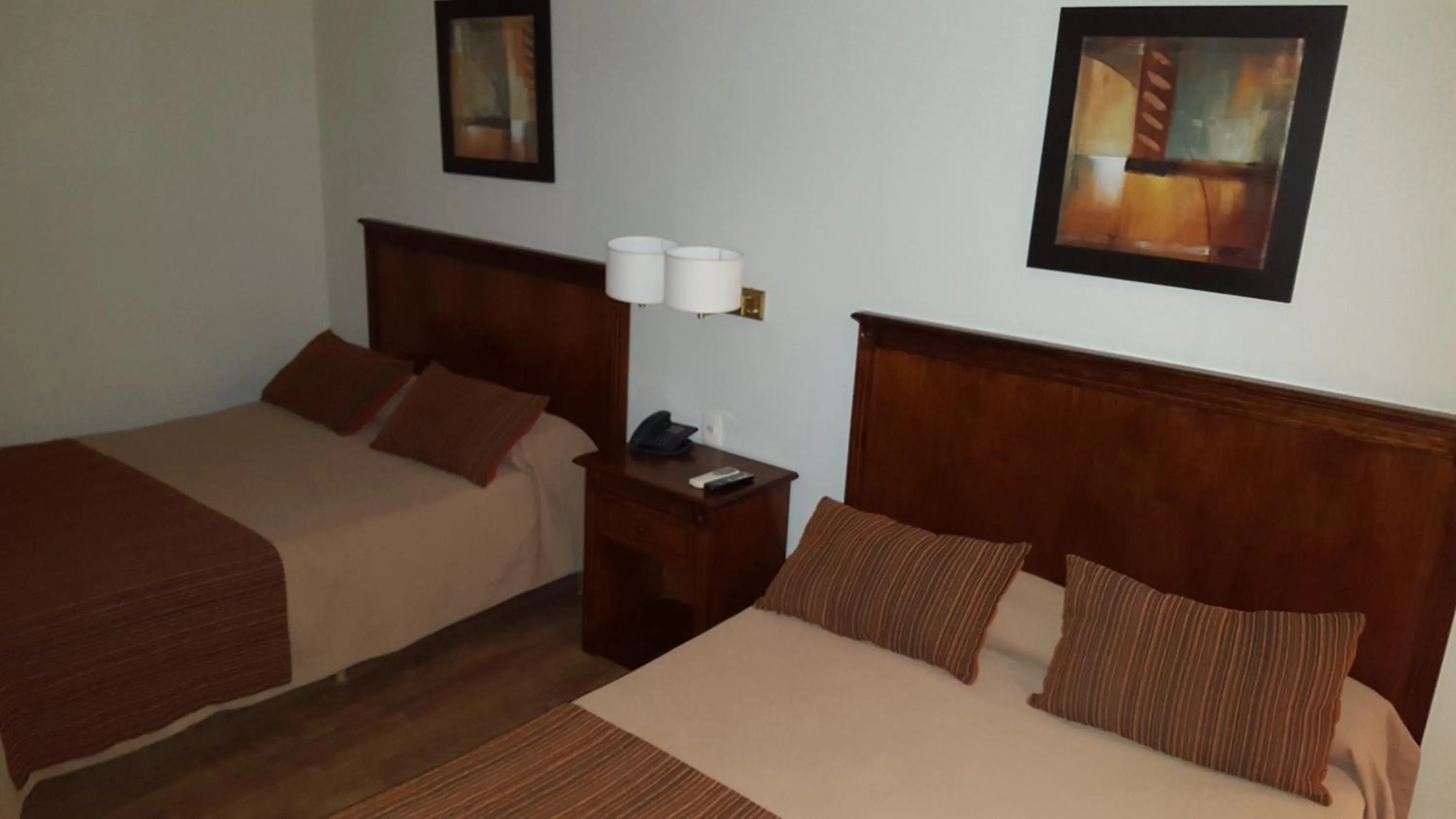 Bed in Howard Johnson by Wyndham San Pedro