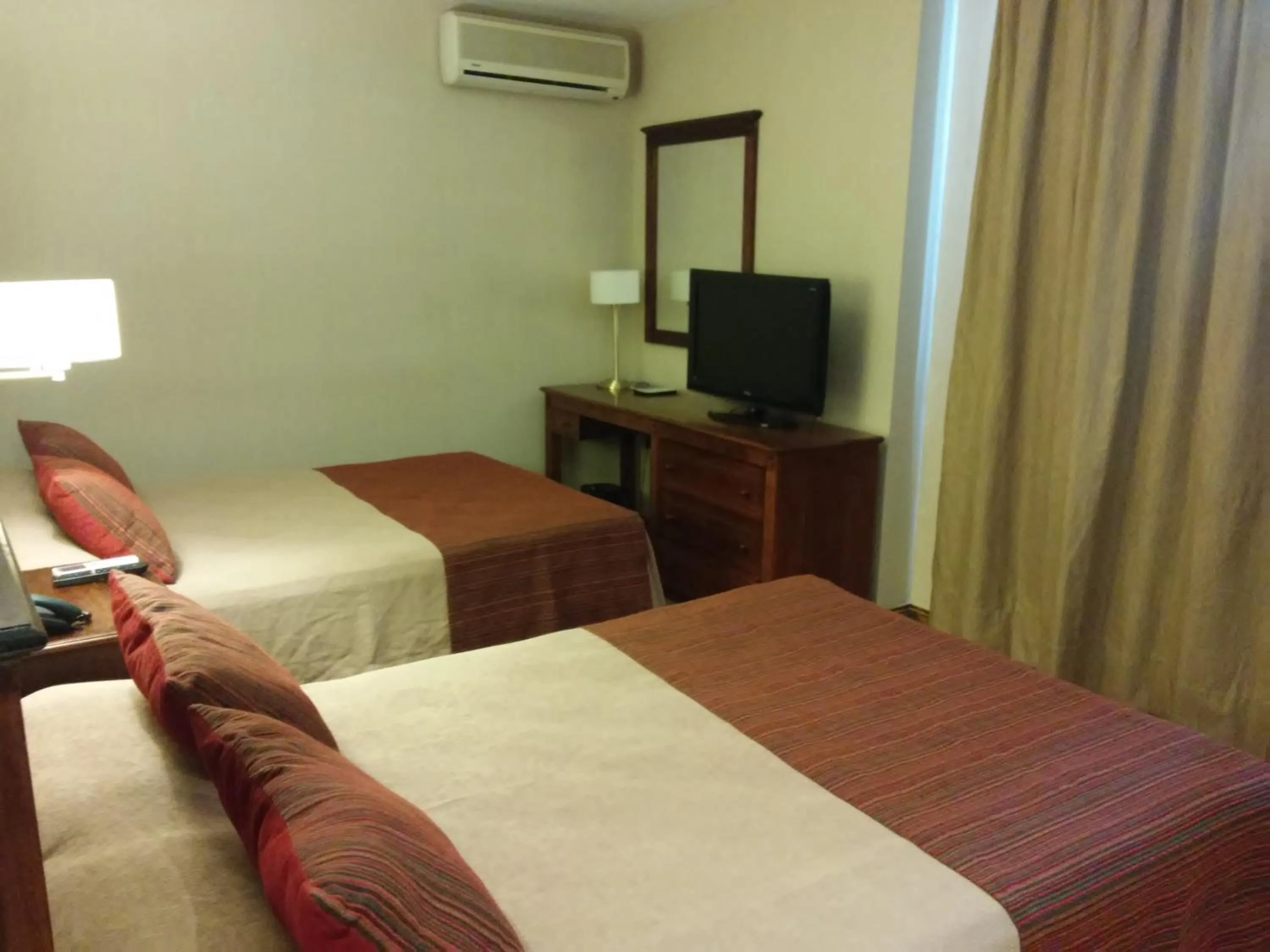 Bed in Howard Johnson by Wyndham San Pedro