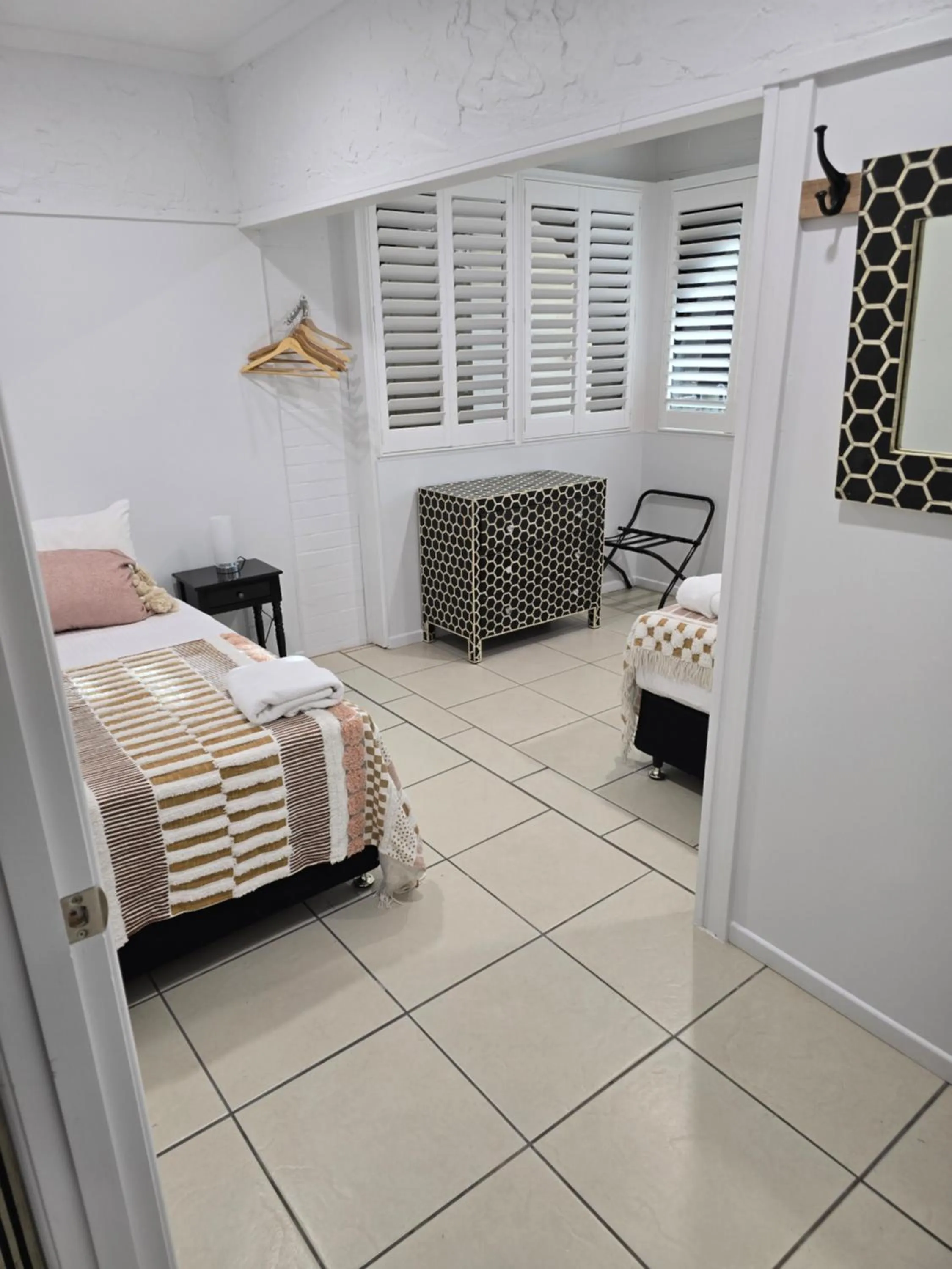 Bed in Central Park Motel