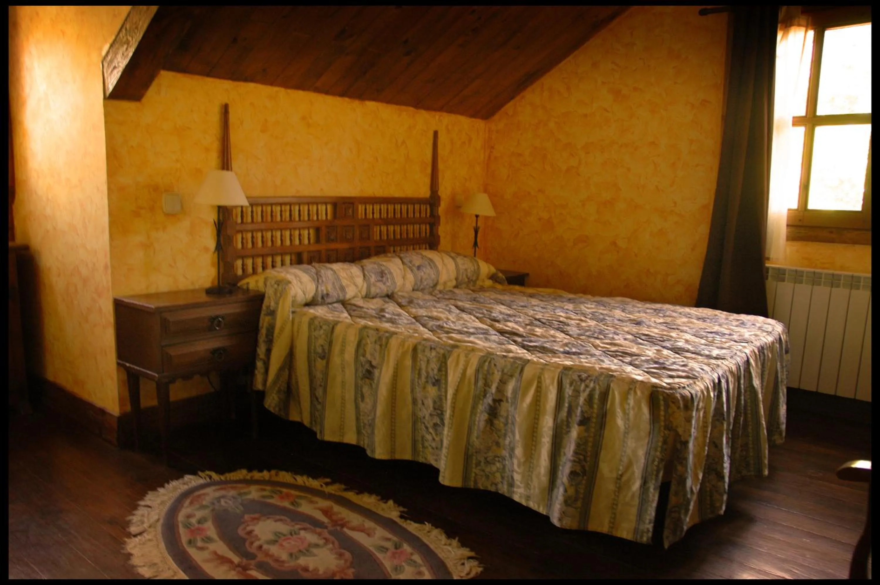 Bed in Posada Rural SPA Granja LA TEJERA de Lozoya