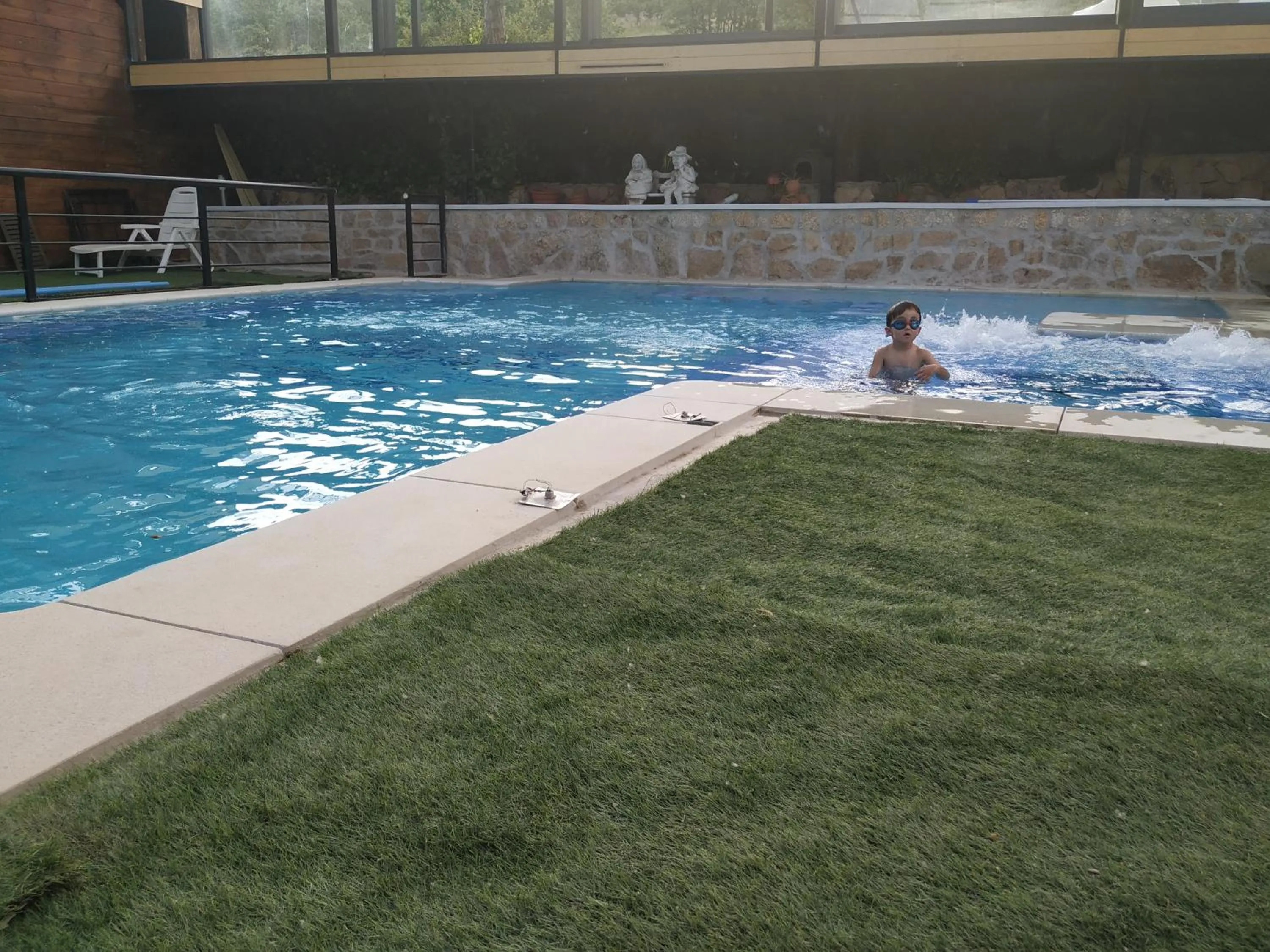 Swimming pool in Posada Rural SPA Granja LA TEJERA de Lozoya