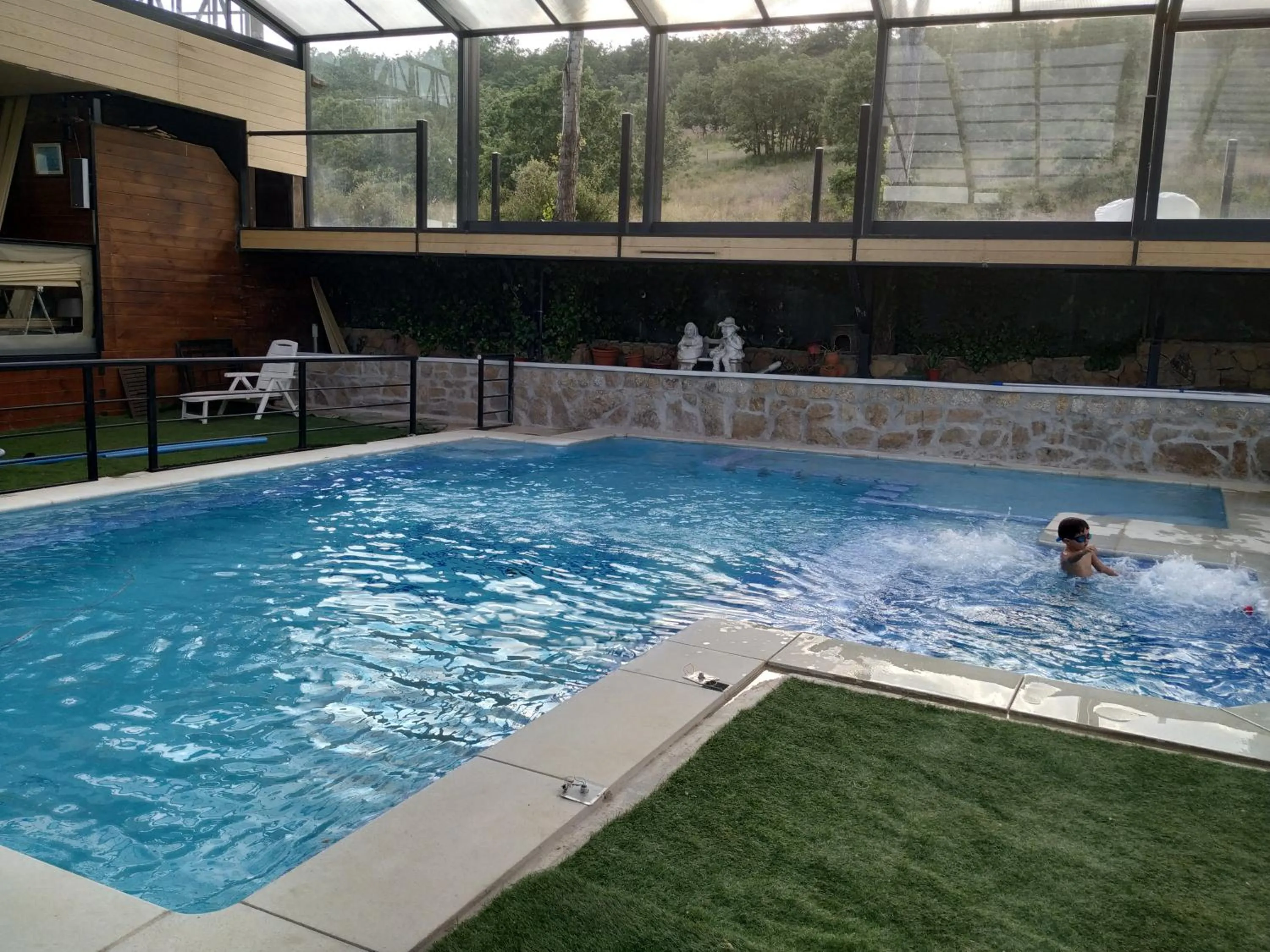 Swimming pool in Posada Rural SPA Granja LA TEJERA de Lozoya