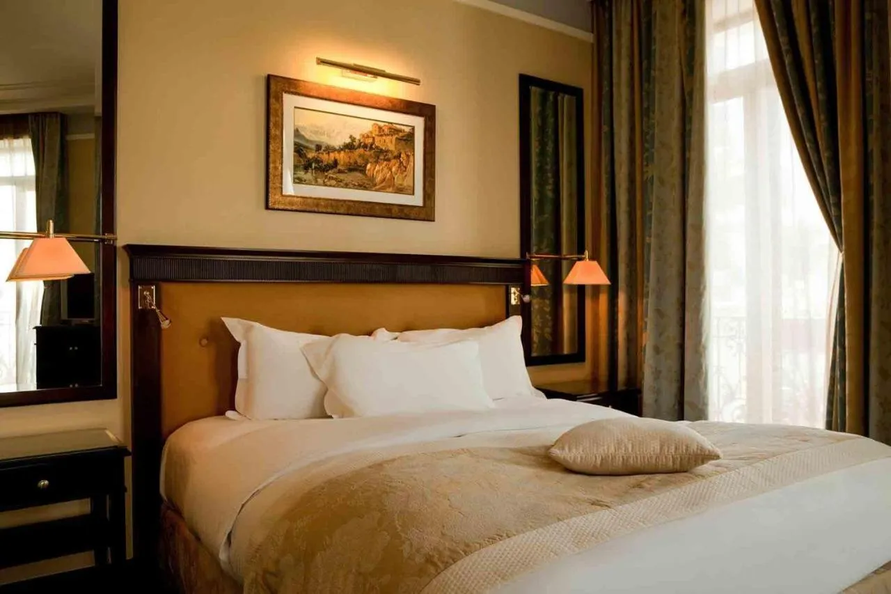 Photo of the whole room, Bed in Royal Hotel Oran - MGallery Collection