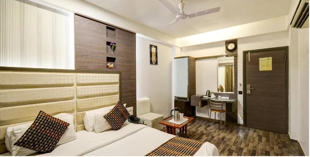 Bed in Atithi The Hotel