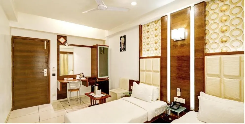 Bed in Atithi The Hotel