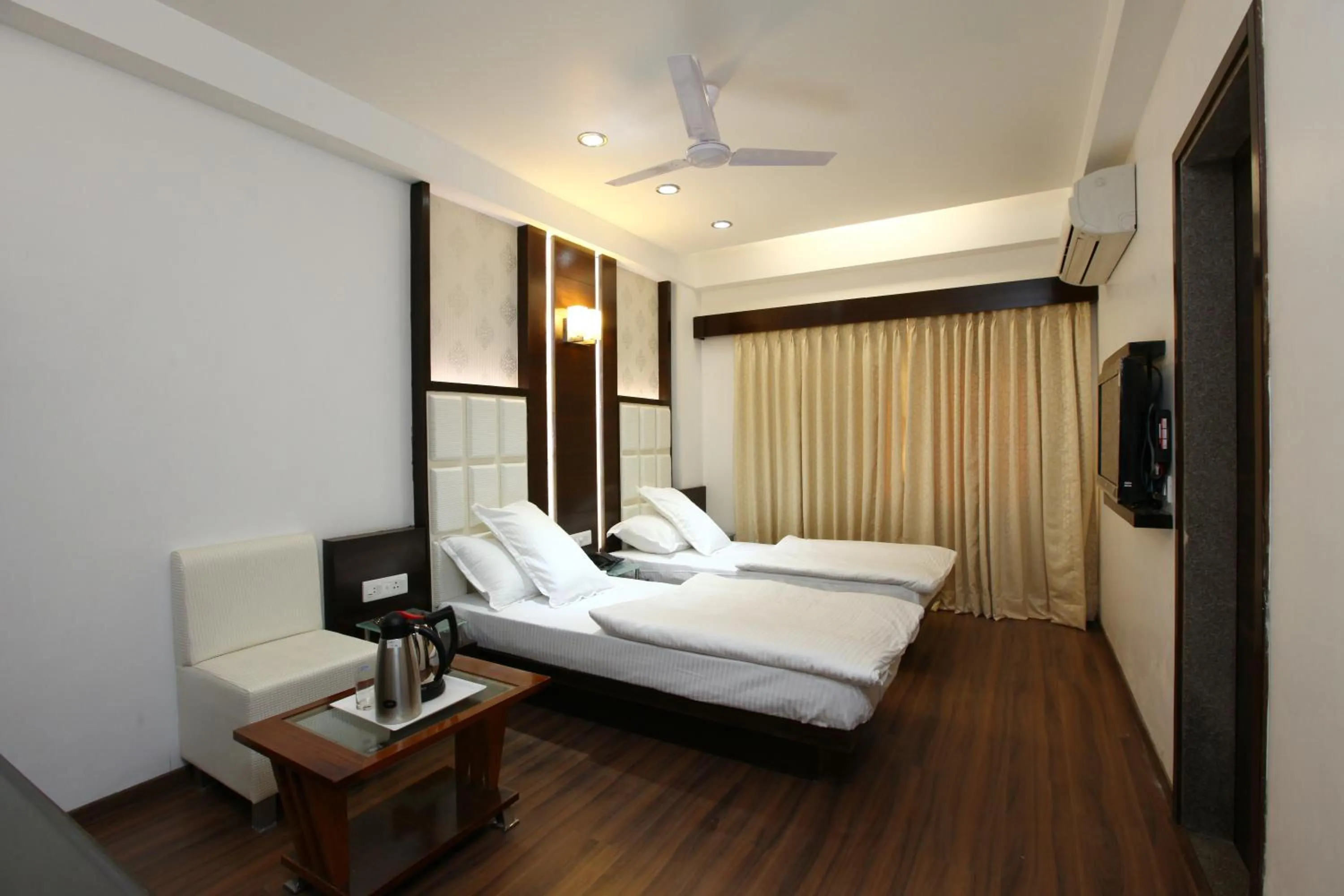 Photo of the whole room, Bed in Atithi The Hotel