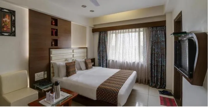 Bed in Atithi The Hotel