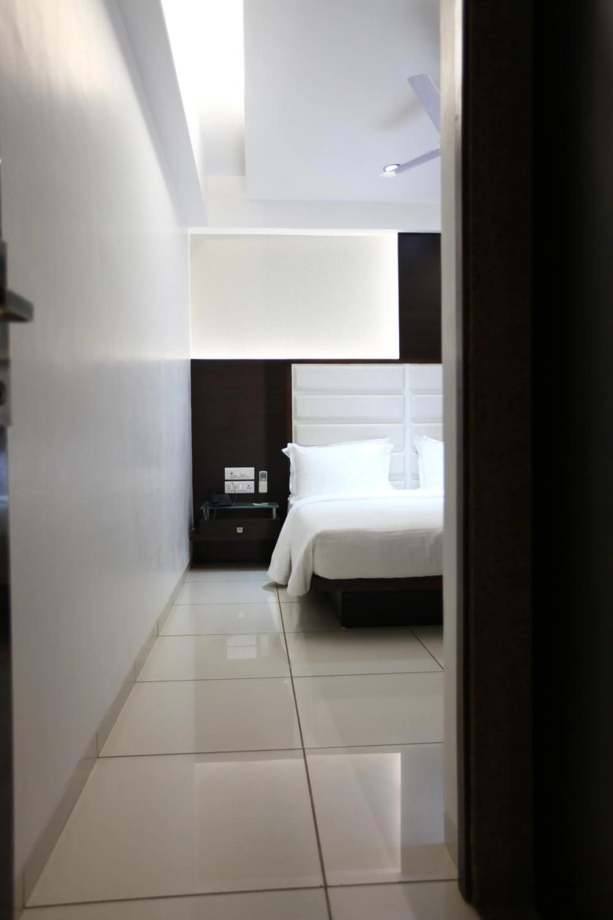 Living room, Bed in Atithi The Hotel