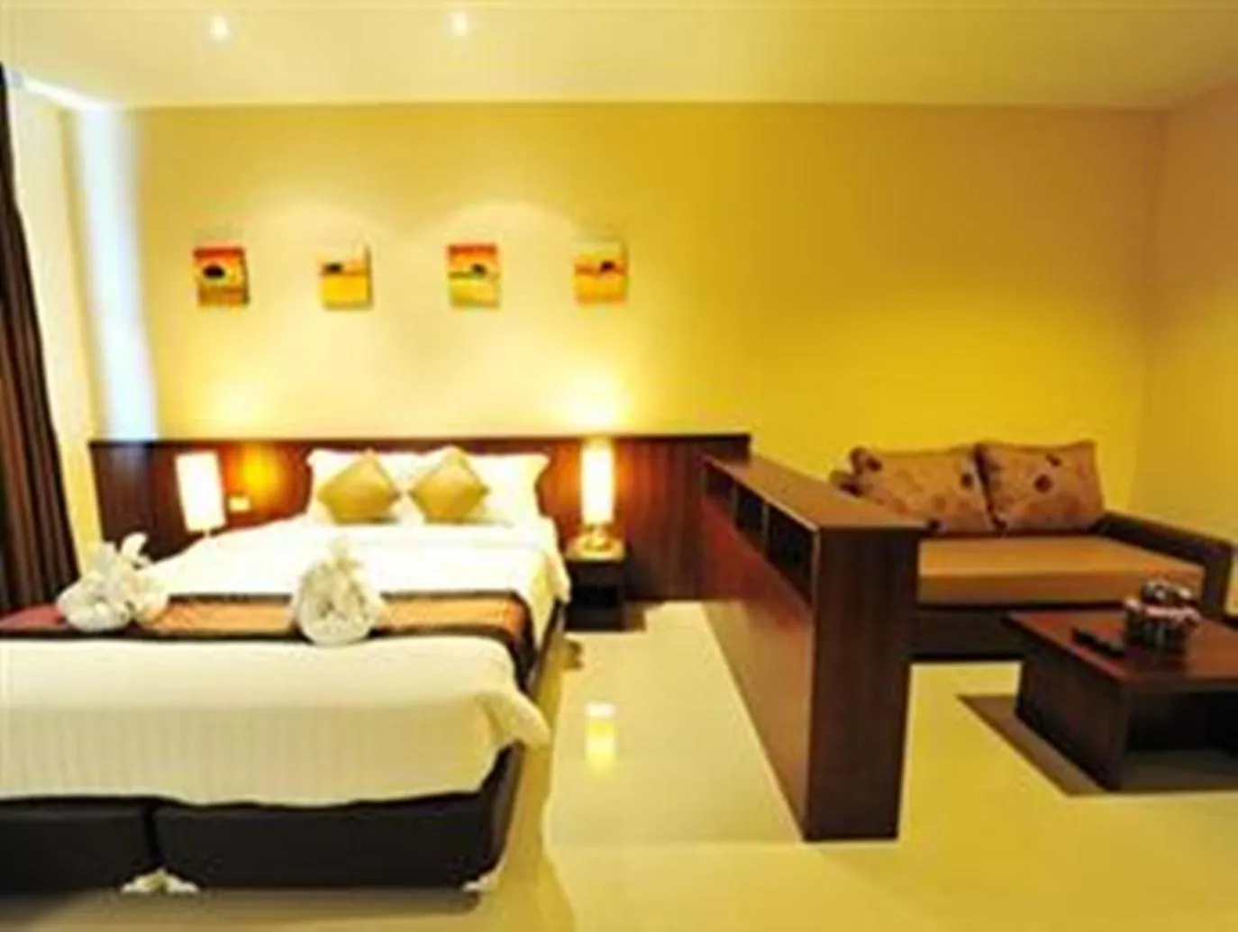 Bed in Green World Palace Hotel