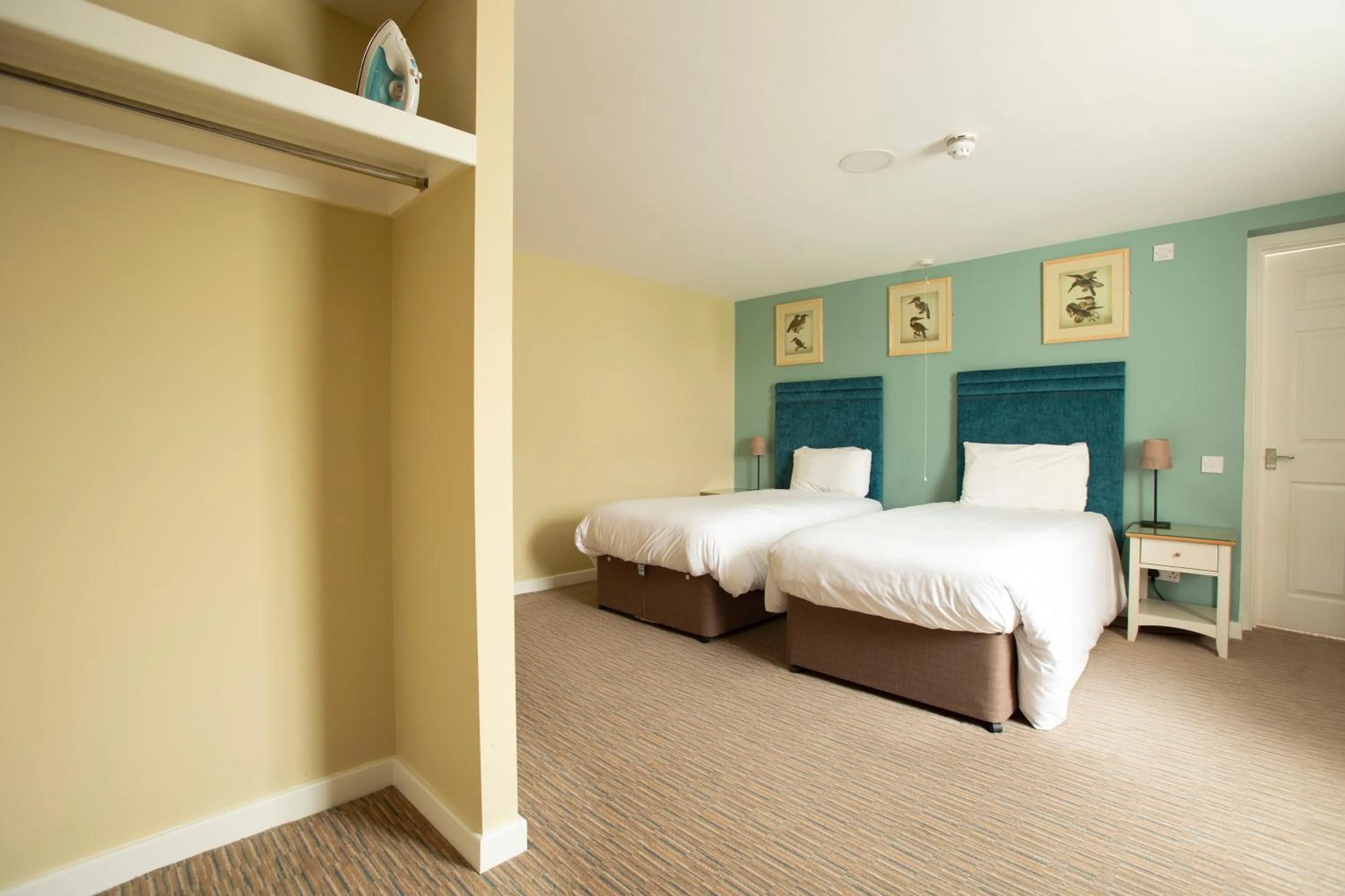 Bed in The Bridge House; BW Signature Collection