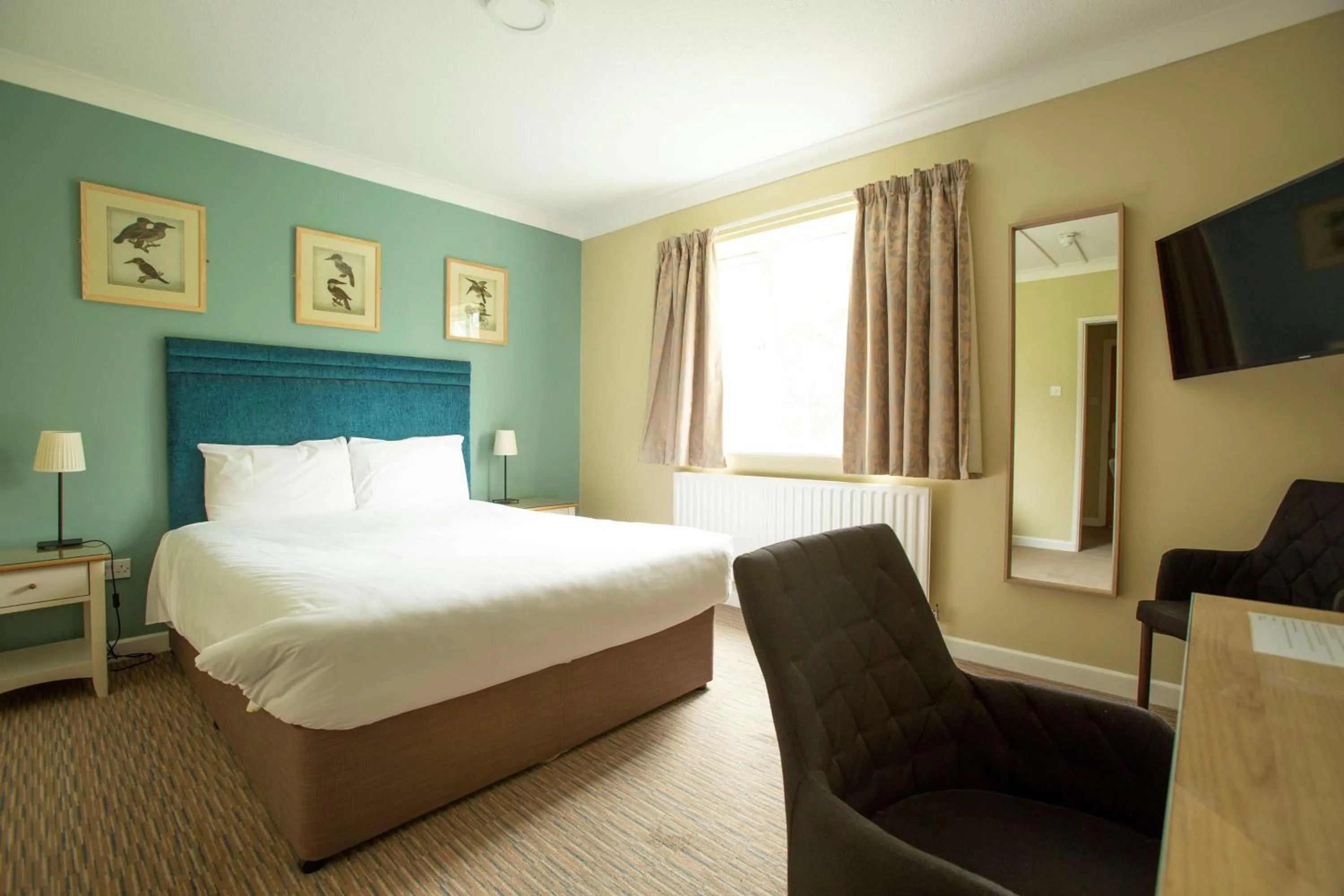 Bed in The Bridge House; BW Signature Collection