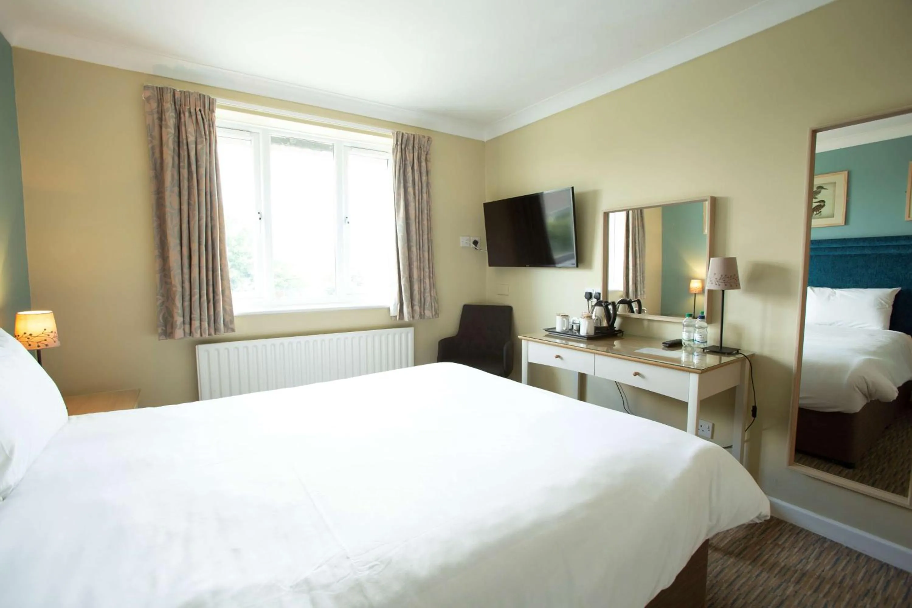 Bed in The Bridge House; BW Signature Collection