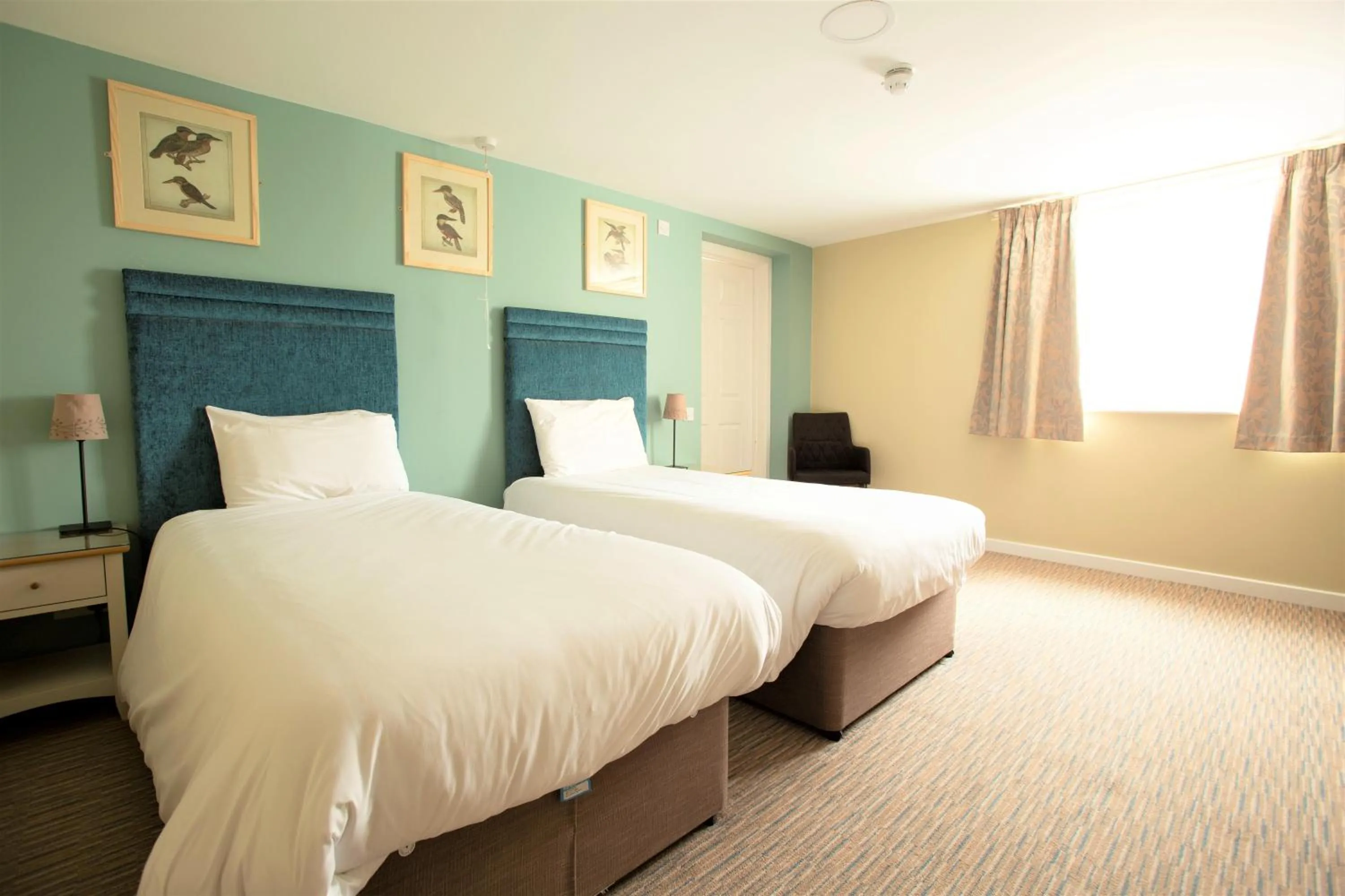 Bed in The Bridge House; BW Signature Collection