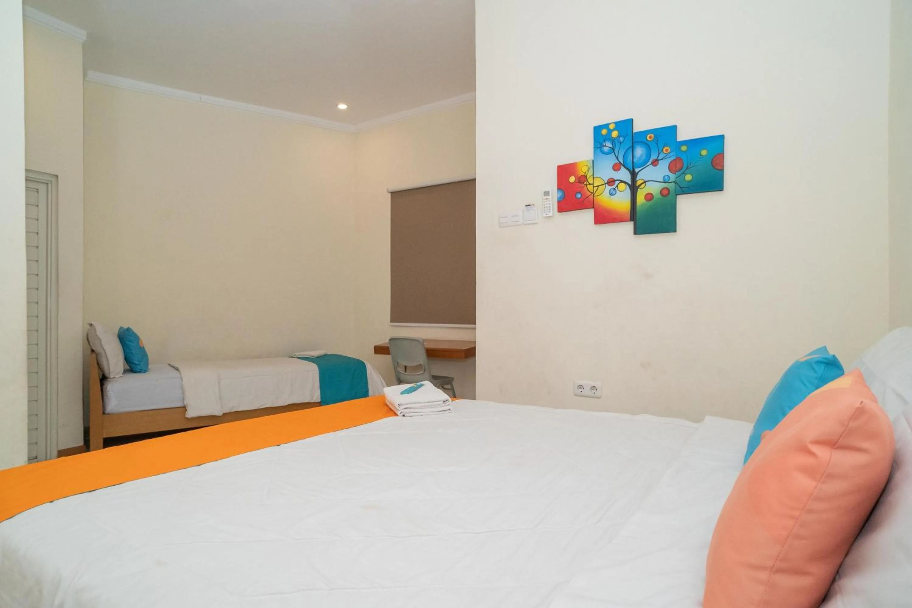 Bed in Sans Hotel FiFFa Pisang Kipas Malang
