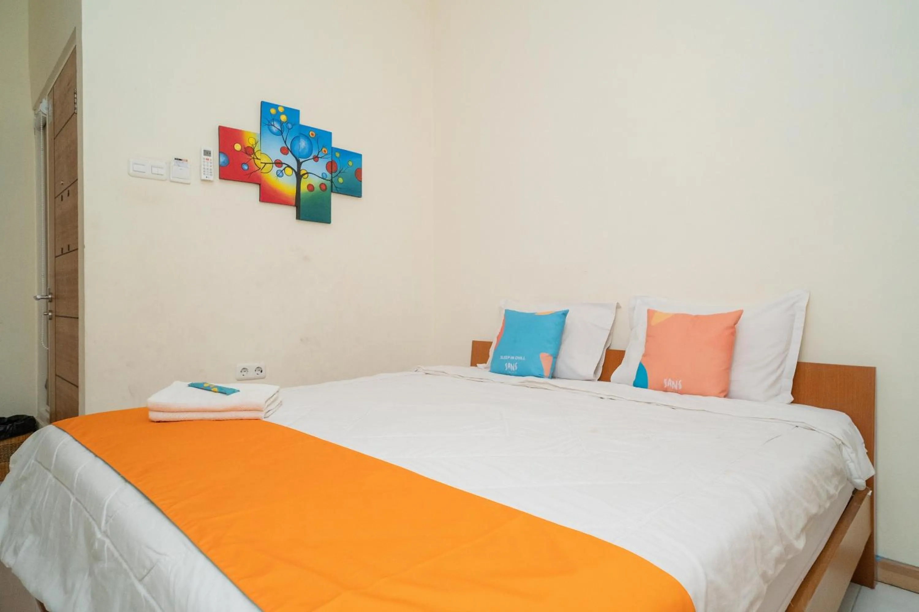 Bed in Sans Hotel FiFFa Pisang Kipas Malang