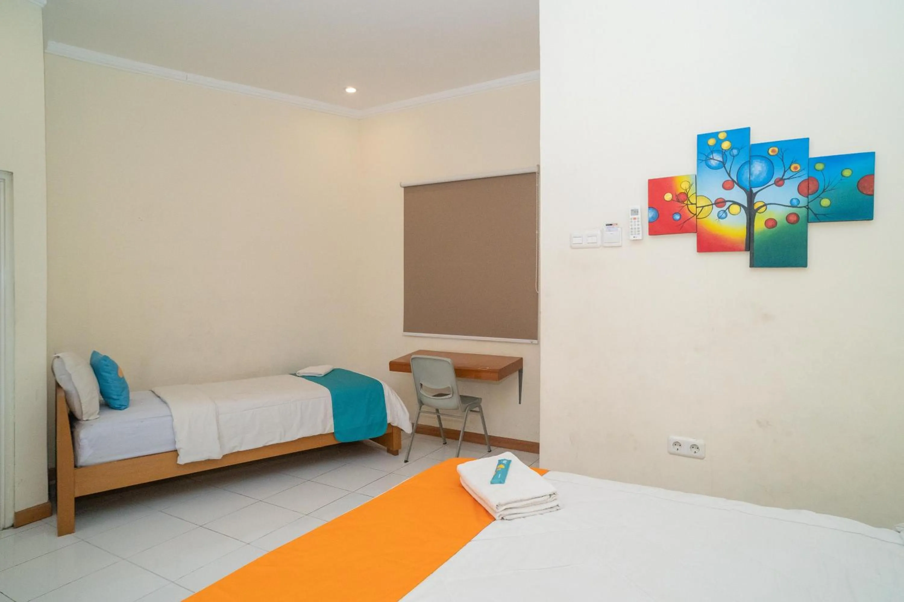 Bed in Sans Hotel FiFFa Pisang Kipas Malang