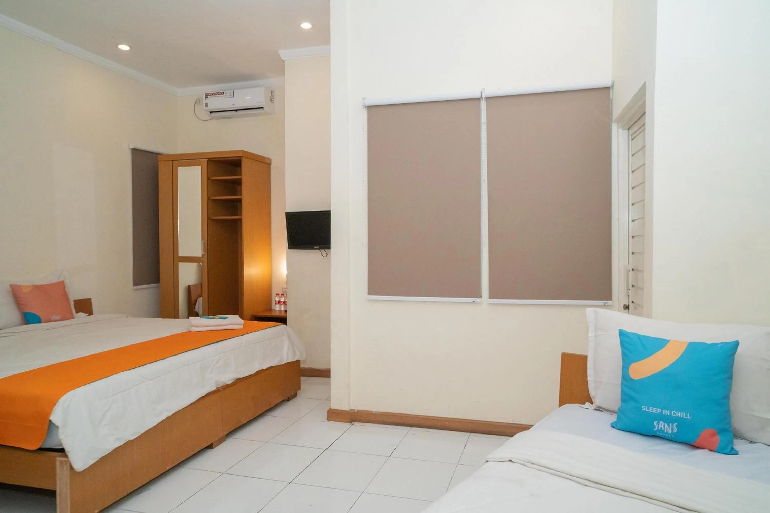 Bed in Sans Hotel FiFFa Pisang Kipas Malang