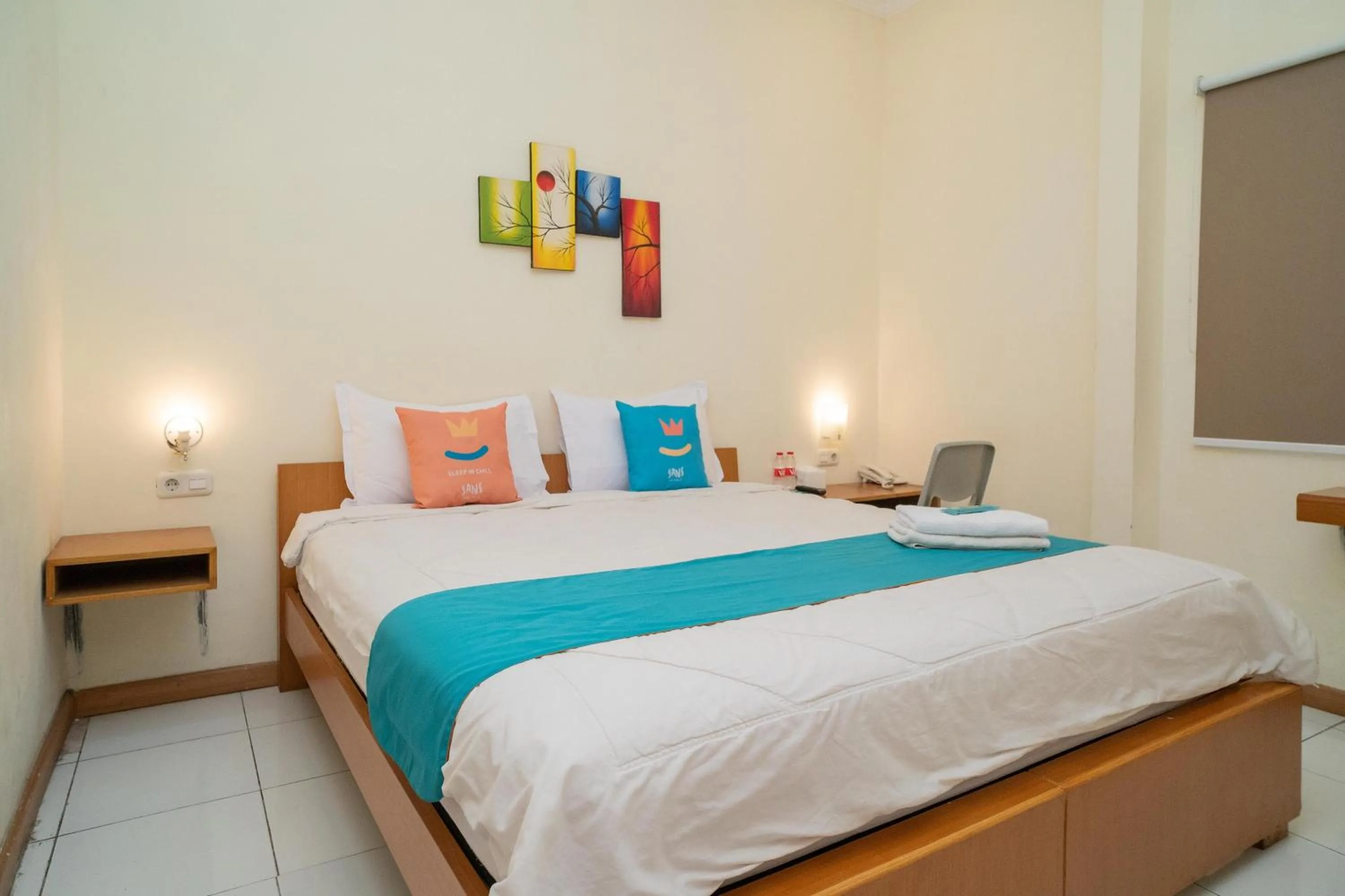 Bed in Sans Hotel FiFFa Pisang Kipas Malang