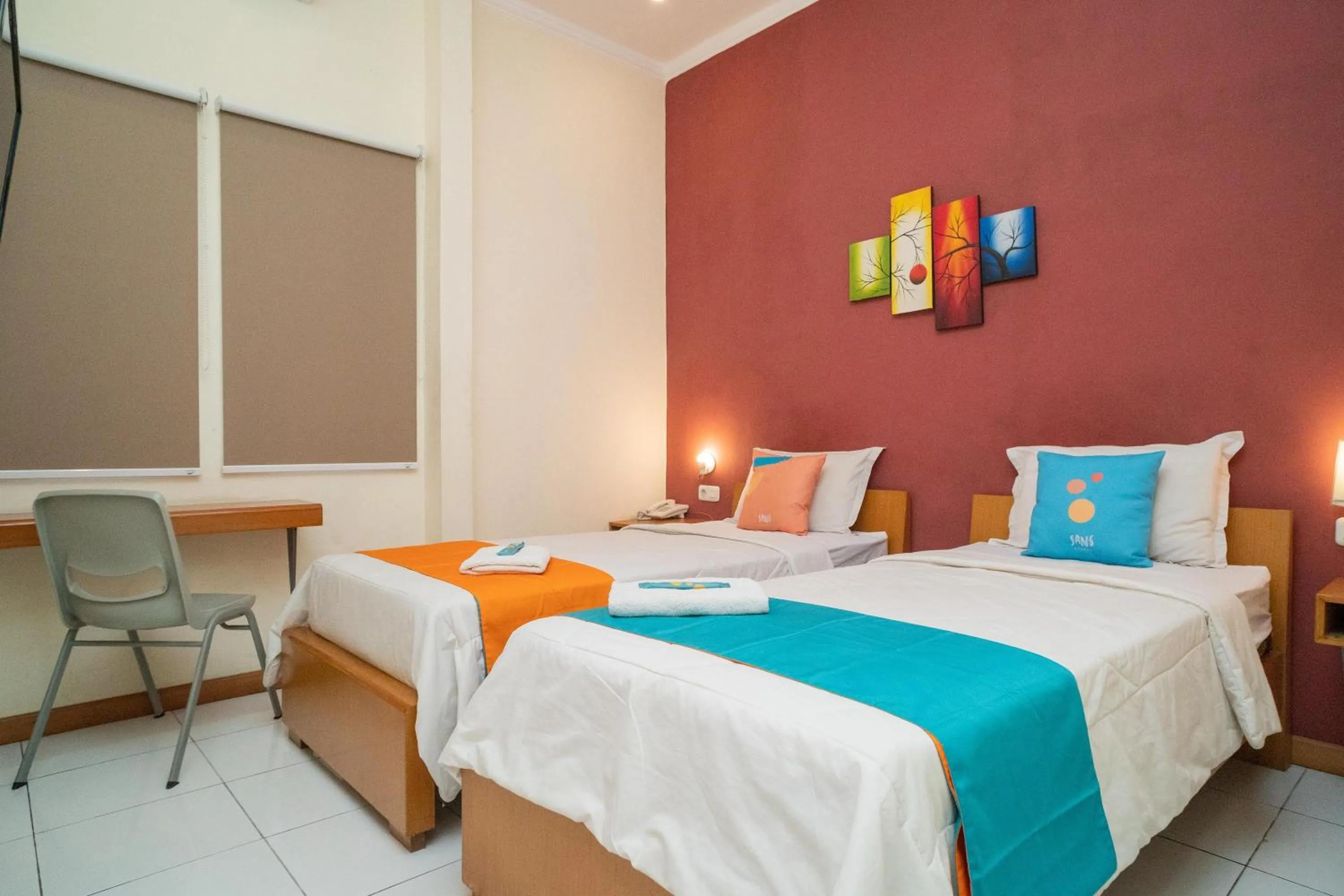 Bed in Sans Hotel FiFFa Pisang Kipas Malang