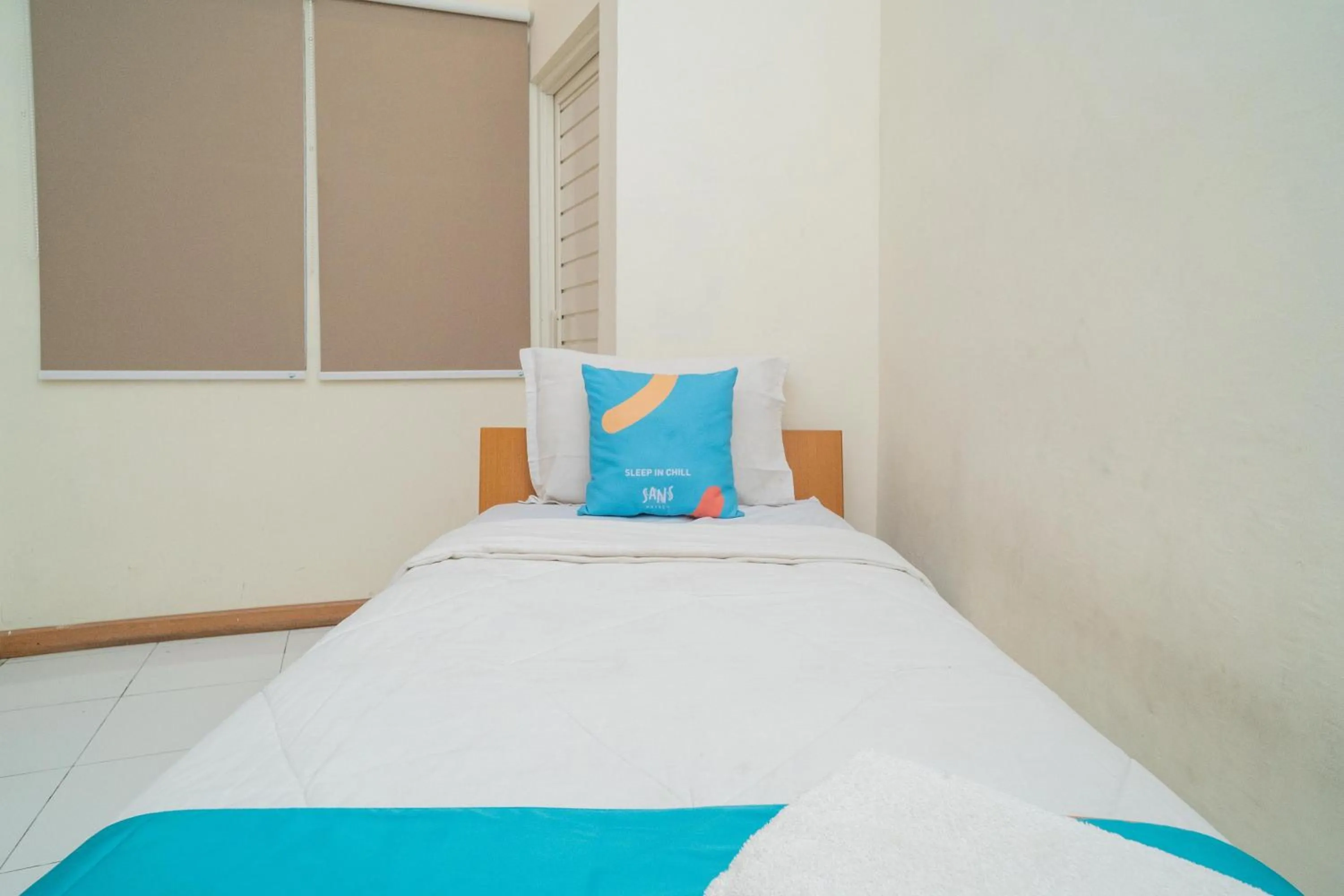 Bed in Sans Hotel FiFFa Pisang Kipas Malang