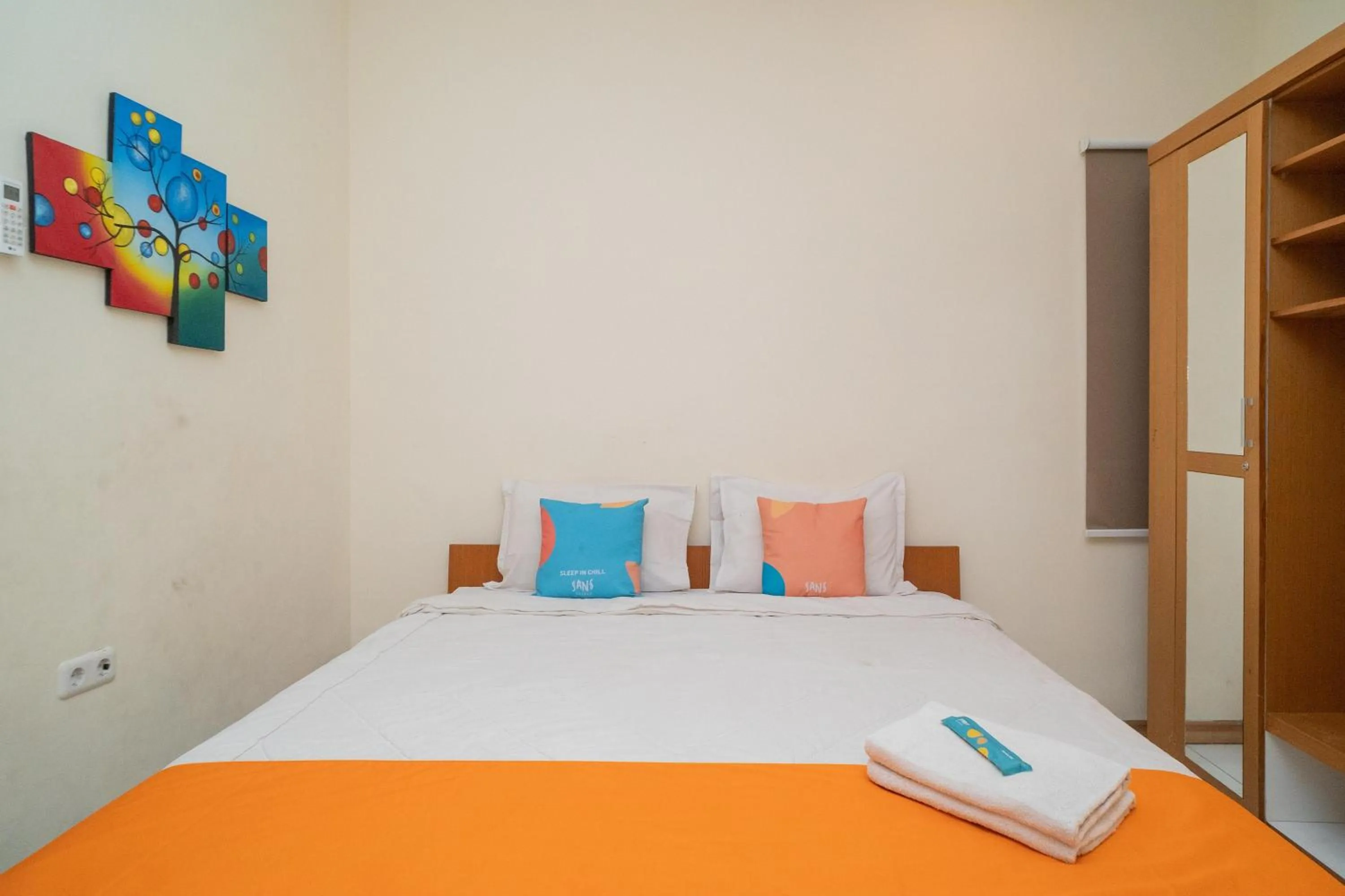 Bed in Sans Hotel FiFFa Pisang Kipas Malang