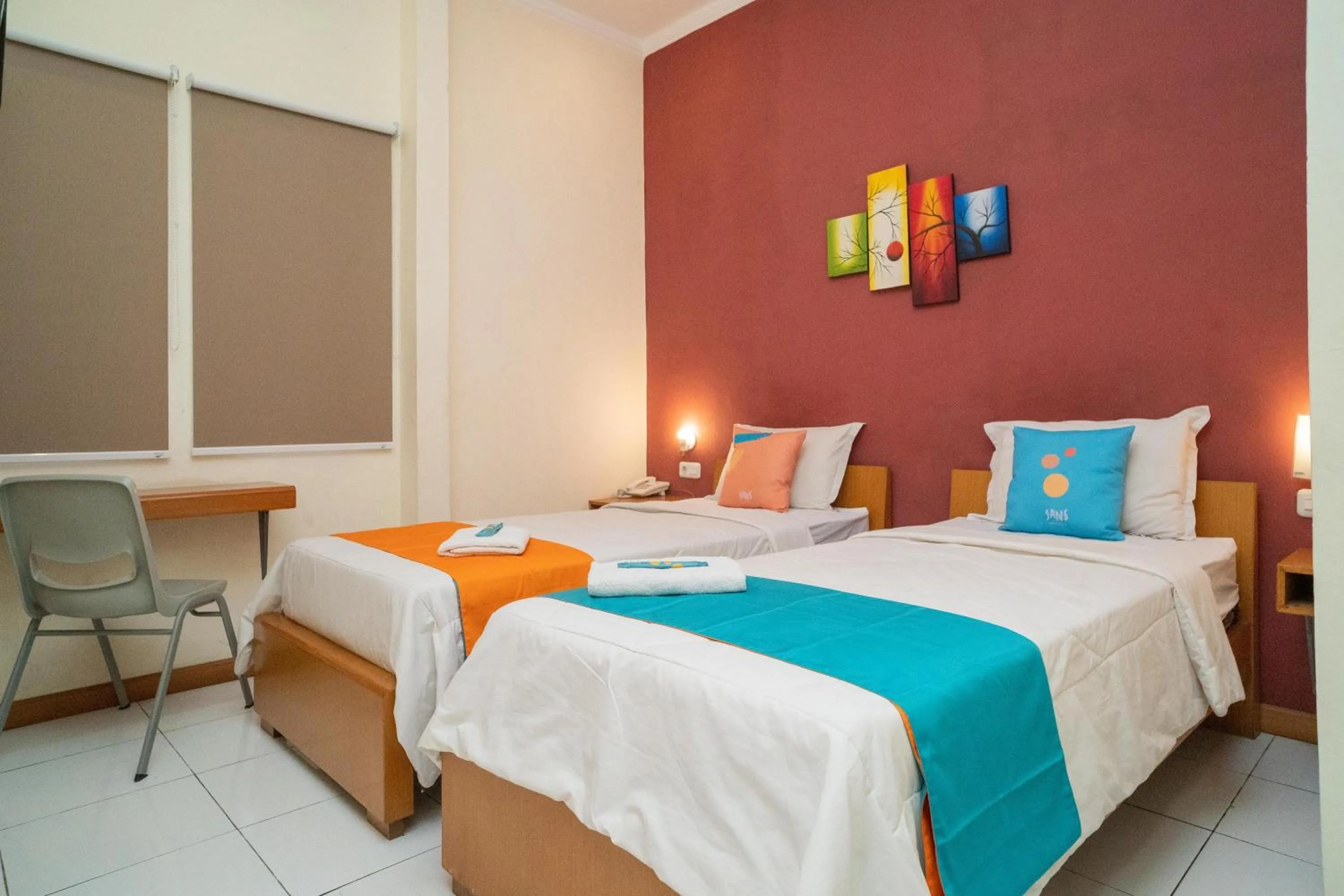Bed in Sans Hotel FiFFa Pisang Kipas Malang