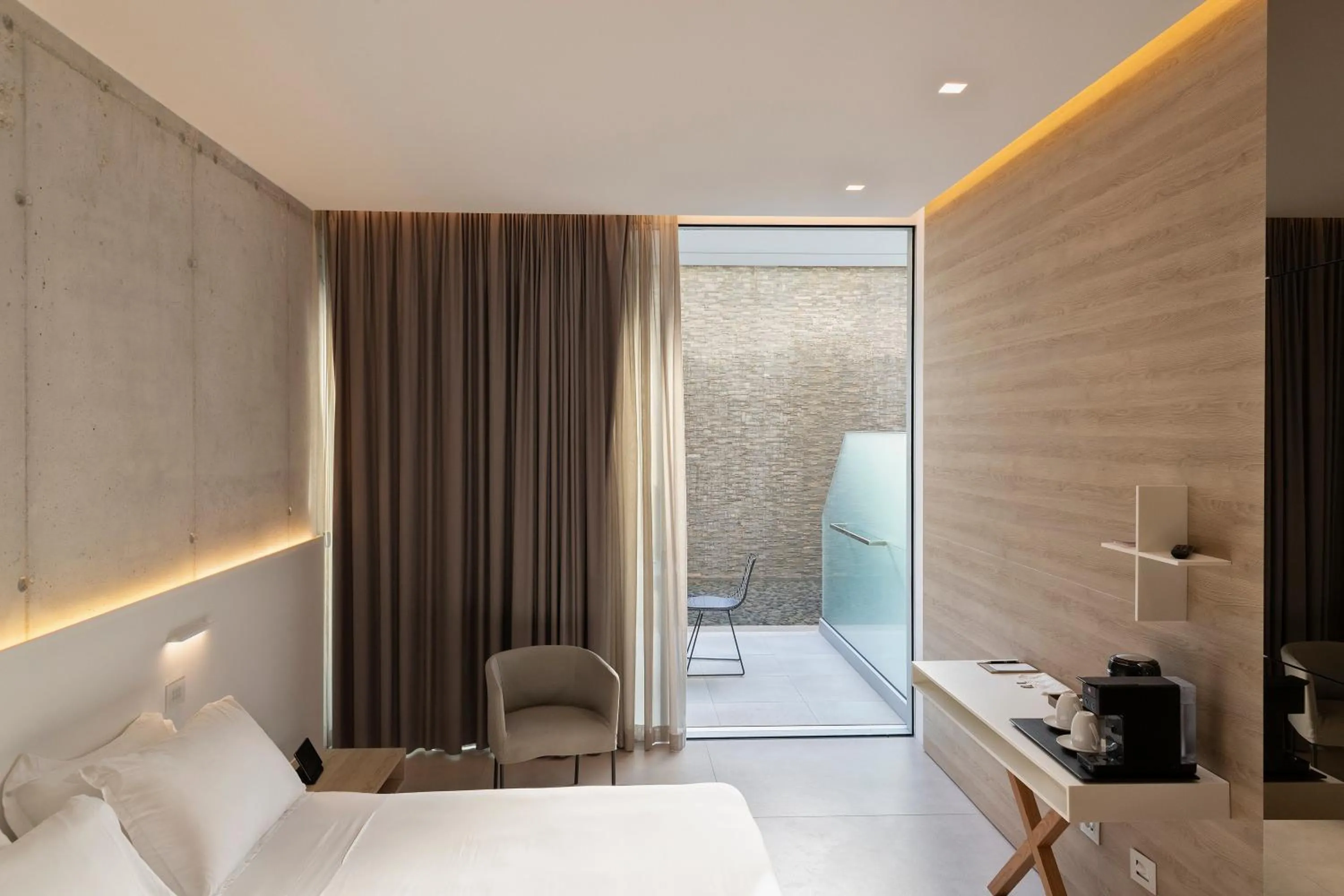 Patio, Bed in Posia Retreat & Spa UNA Esperienze