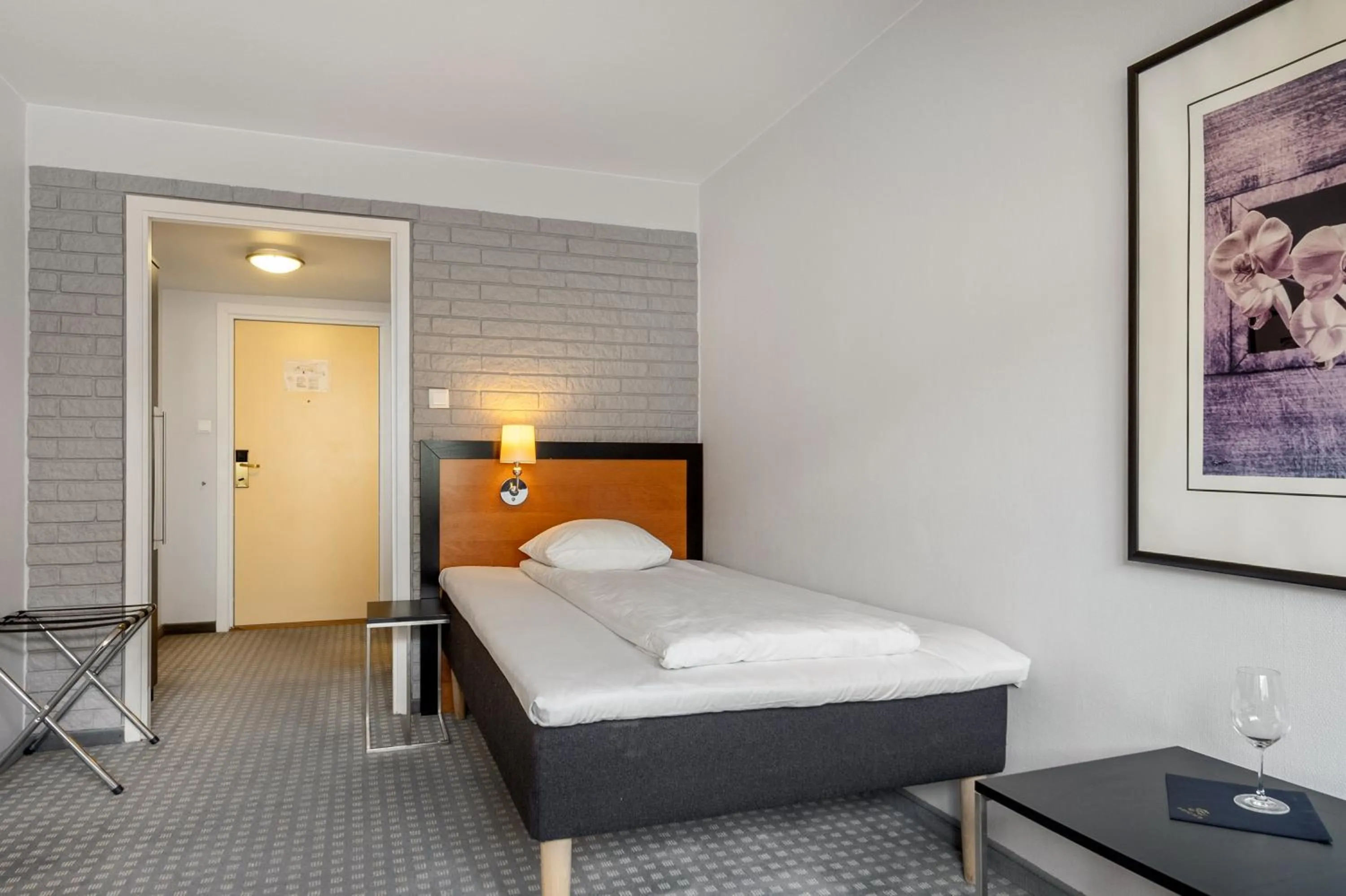 Bed in Frichs Hotel Hamar