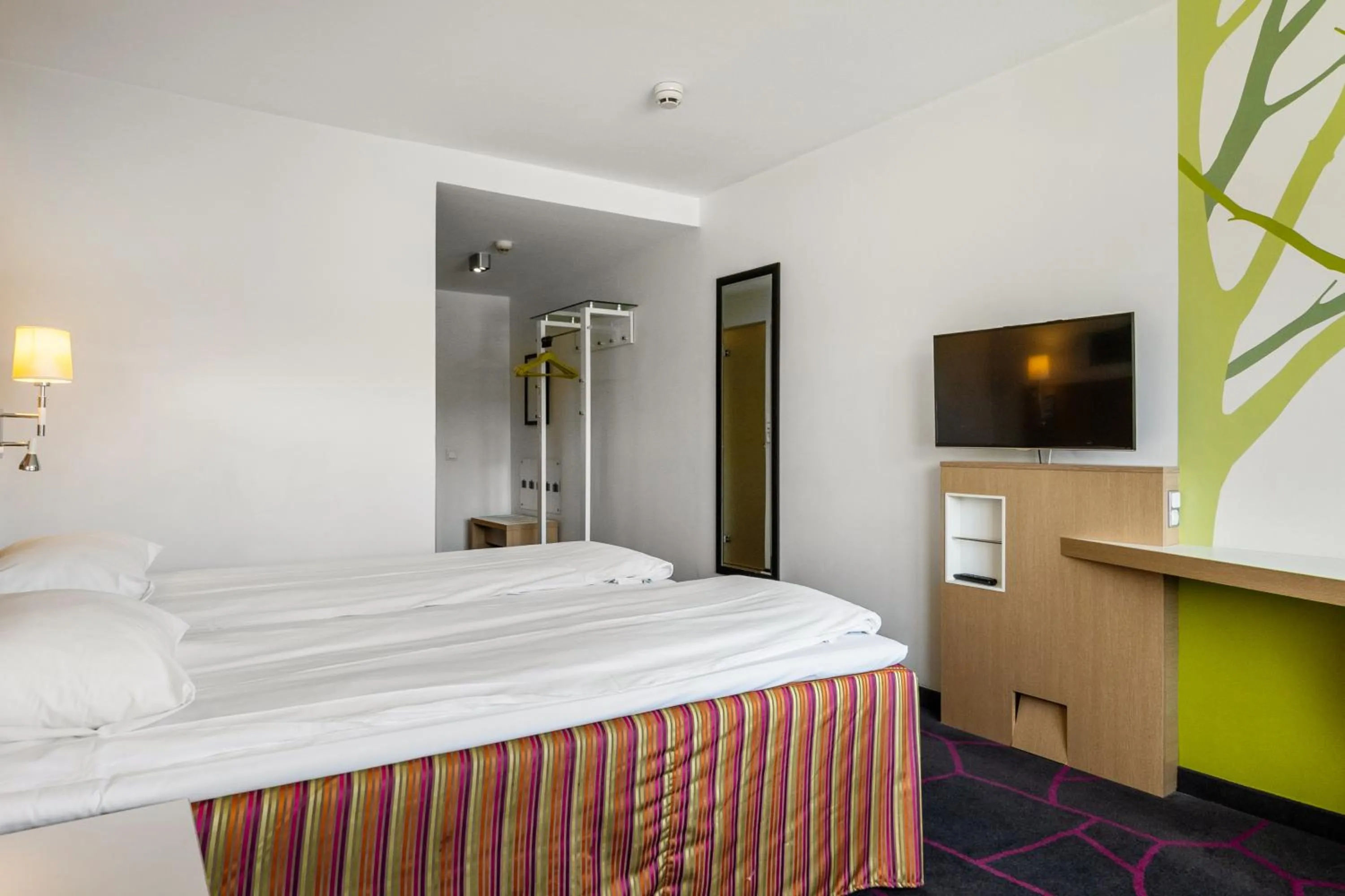 Bed in Frichs Hotel Hamar