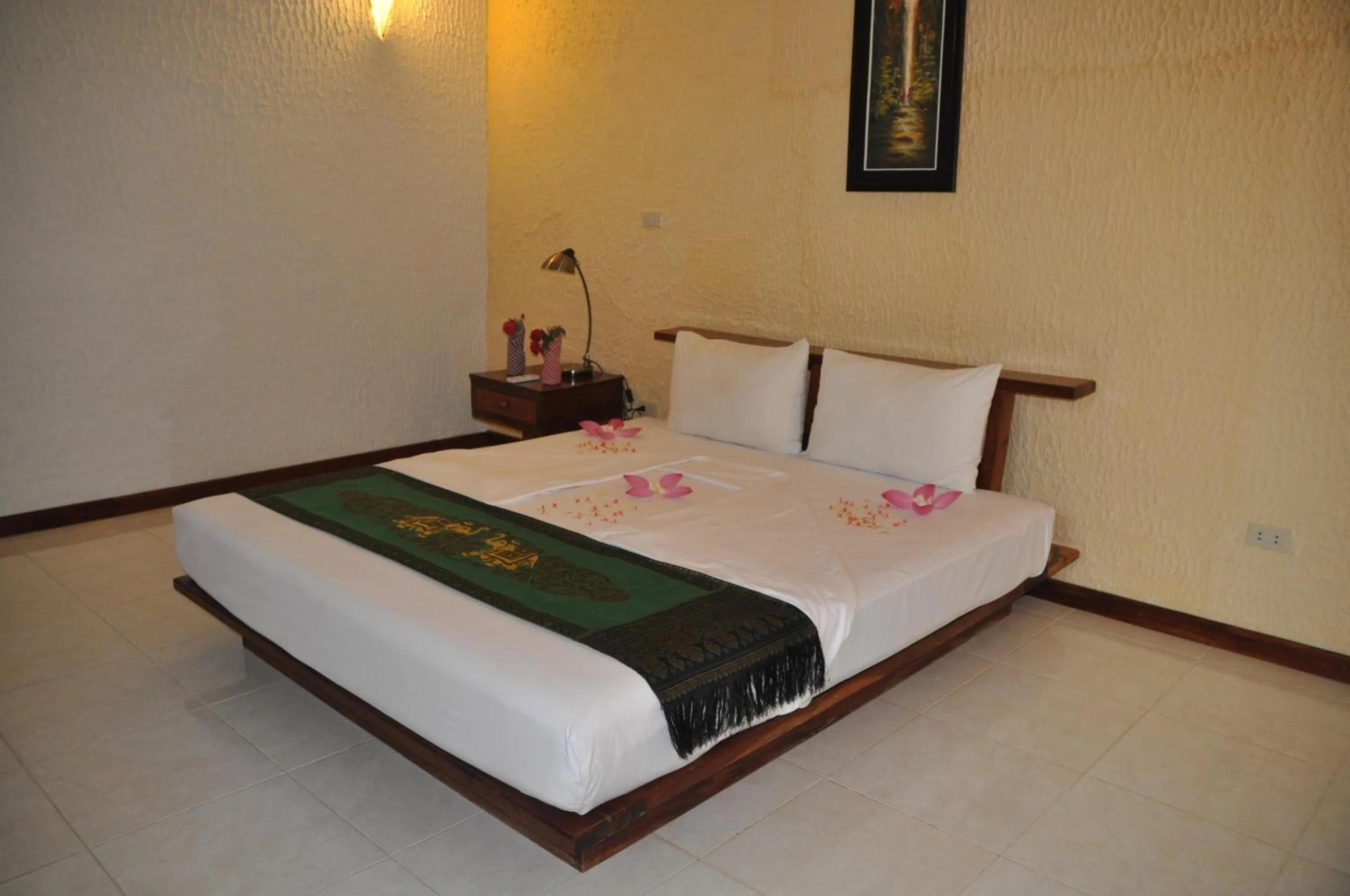 Bed in Memoria Palace & Resort