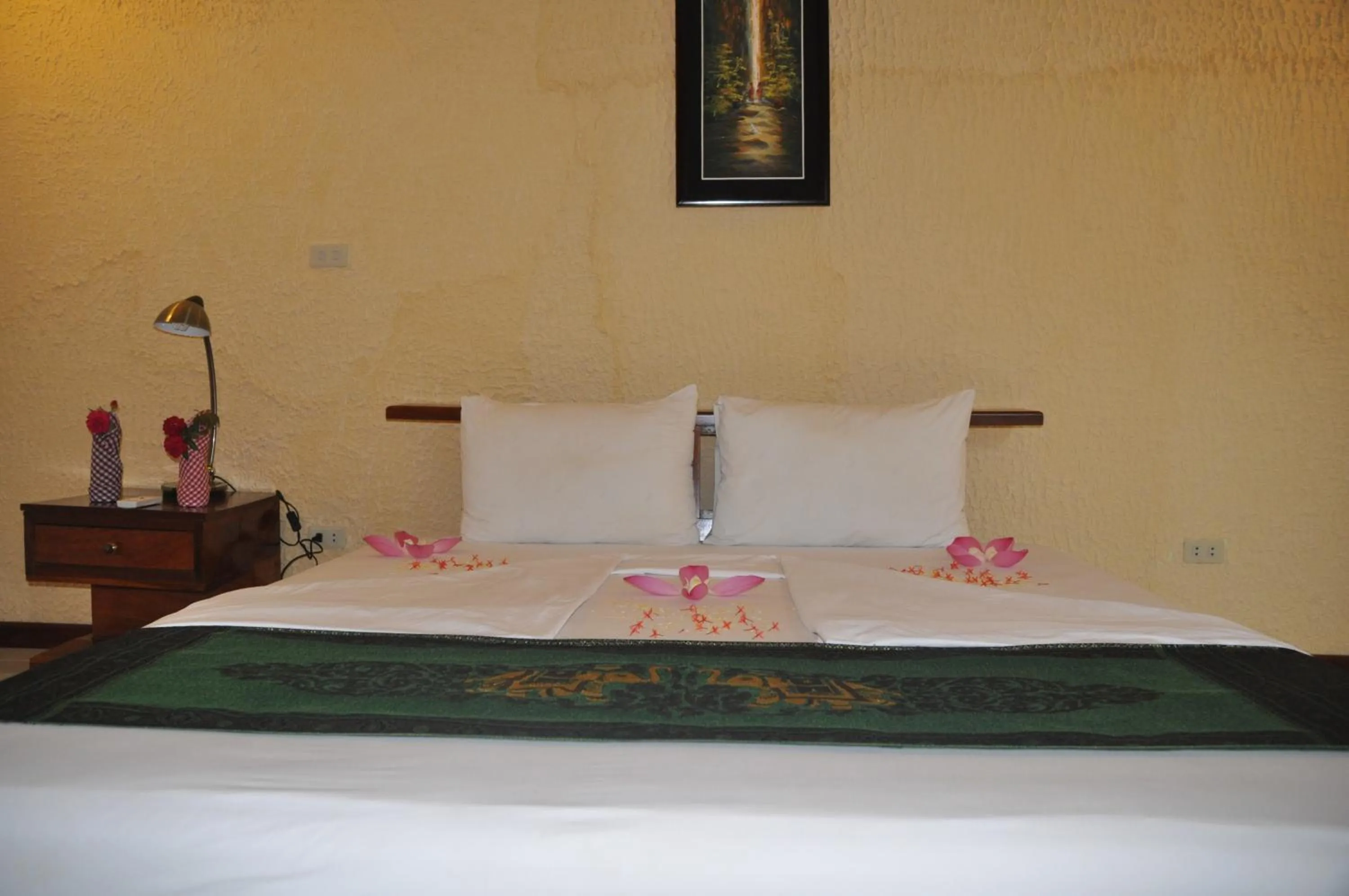 Bed in Memoria Palace & Resort