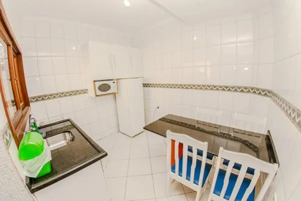 Kitchen or kitchenette in Pousada Cristalmar