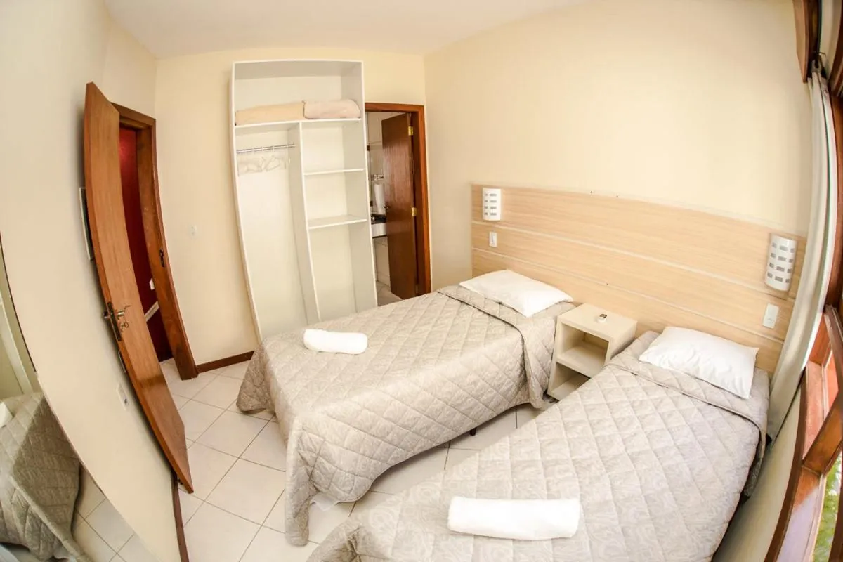 Bed in Pousada Cristalmar