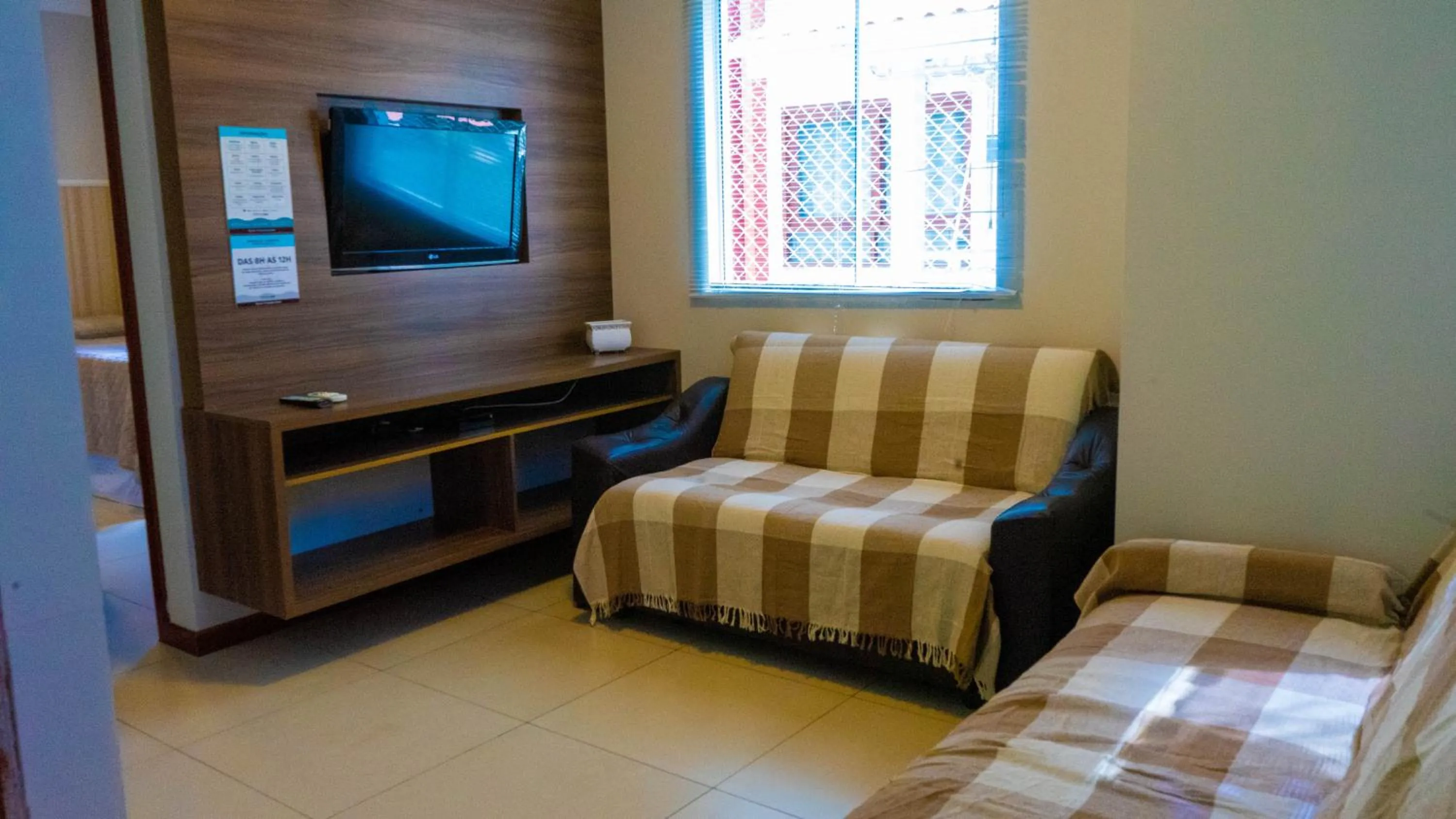 Communal lounge/ TV room in Pousada Cristalmar