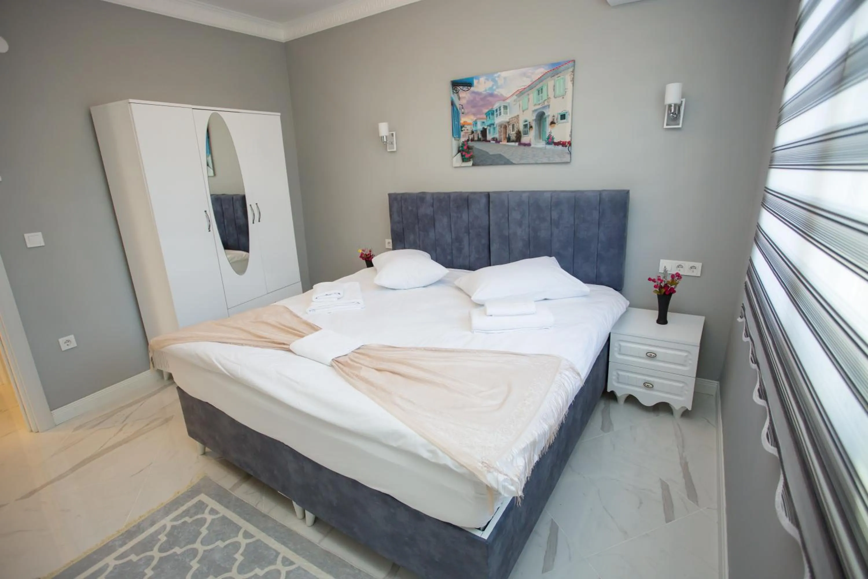 Bed in Little Palace Blue Apartment