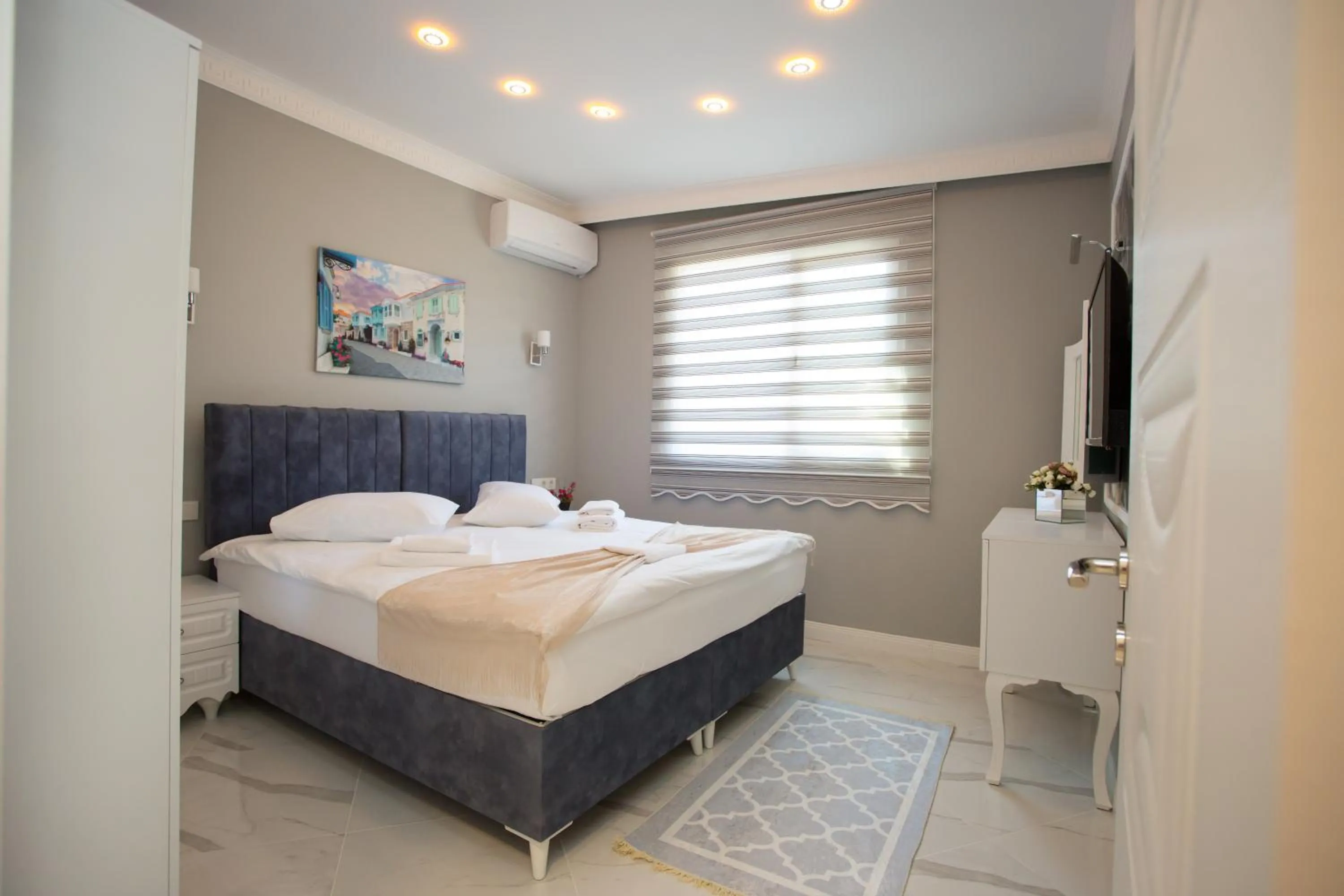 Bed in Little Palace Blue Apartment