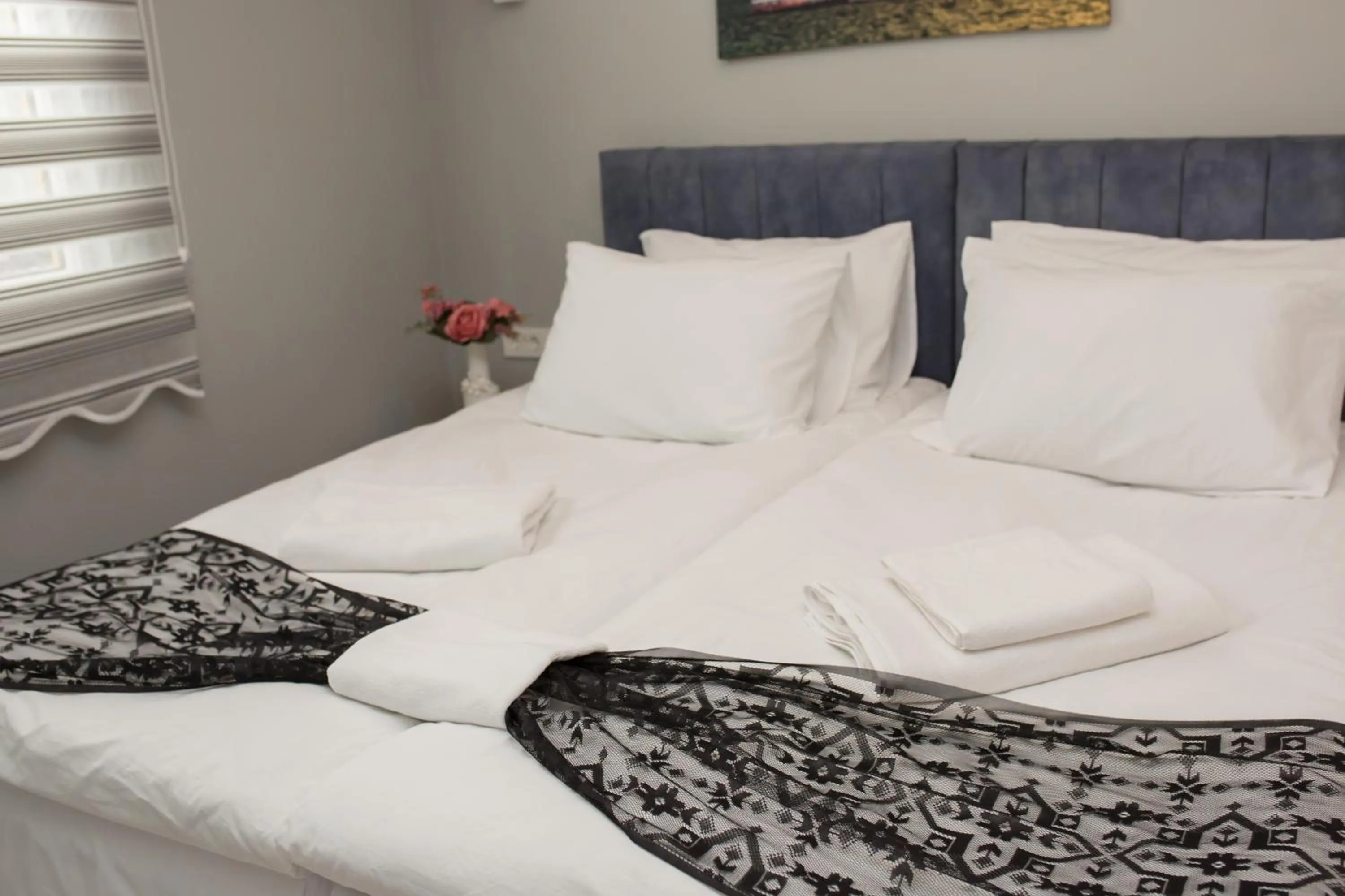 Bed in Little Palace Blue Apartment