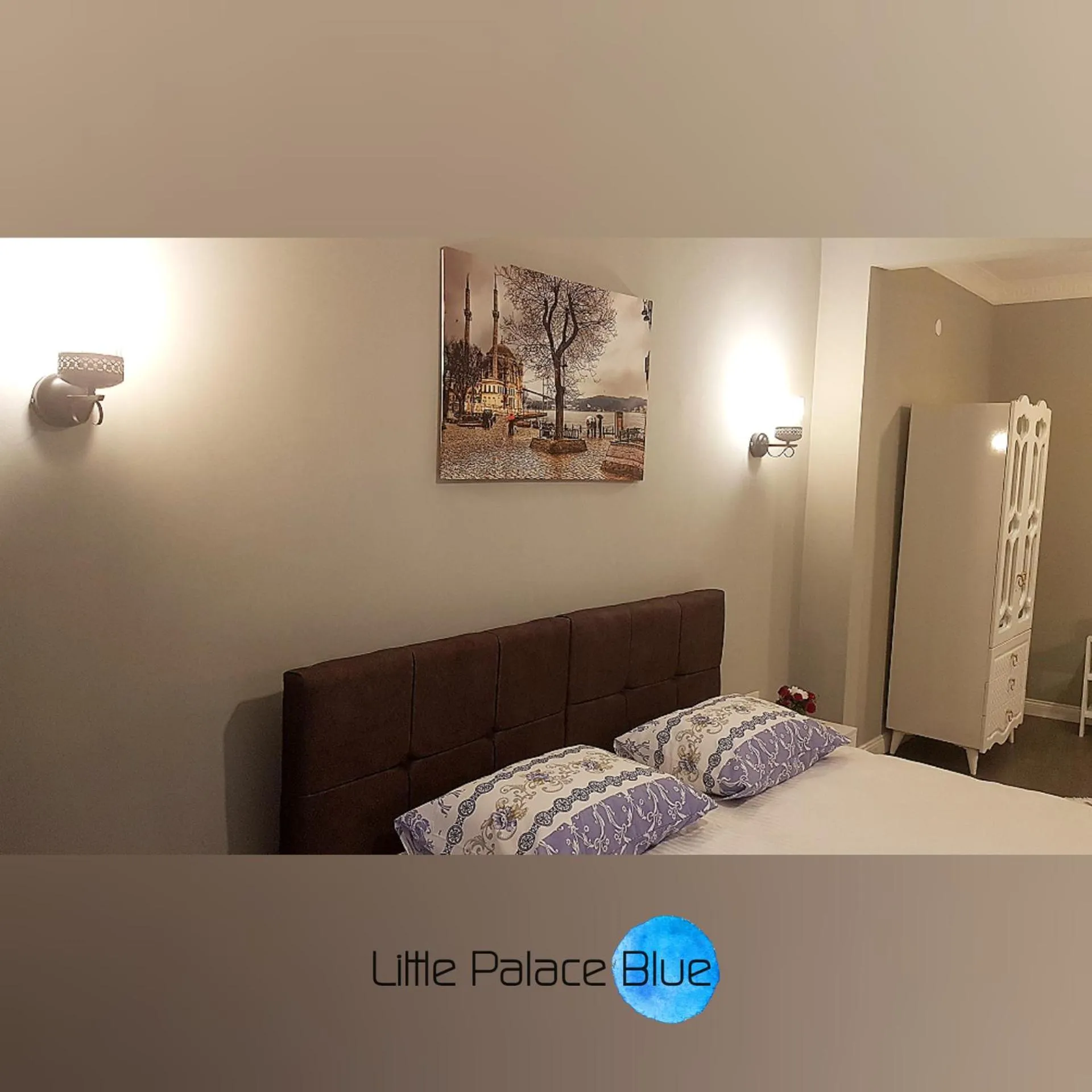 Living room, Bed in Little Palace Blue Apartment