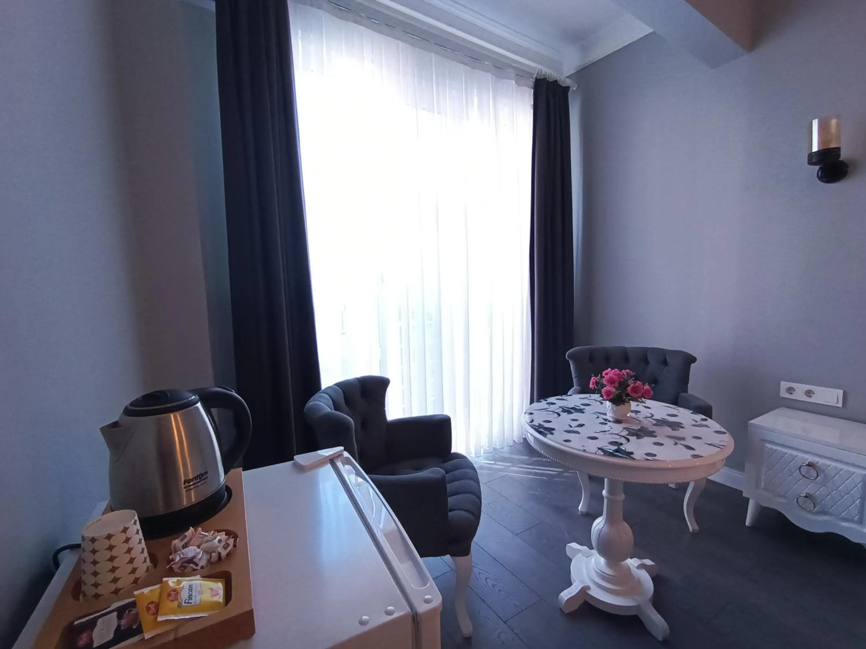 Living room in Little Palace Blue Apartment