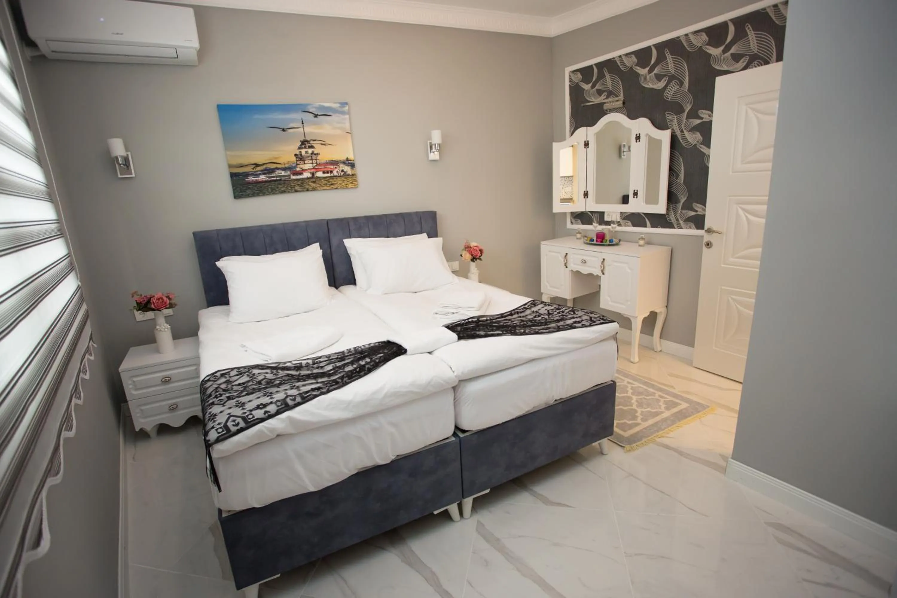 Bed in Little Palace Blue Apartment