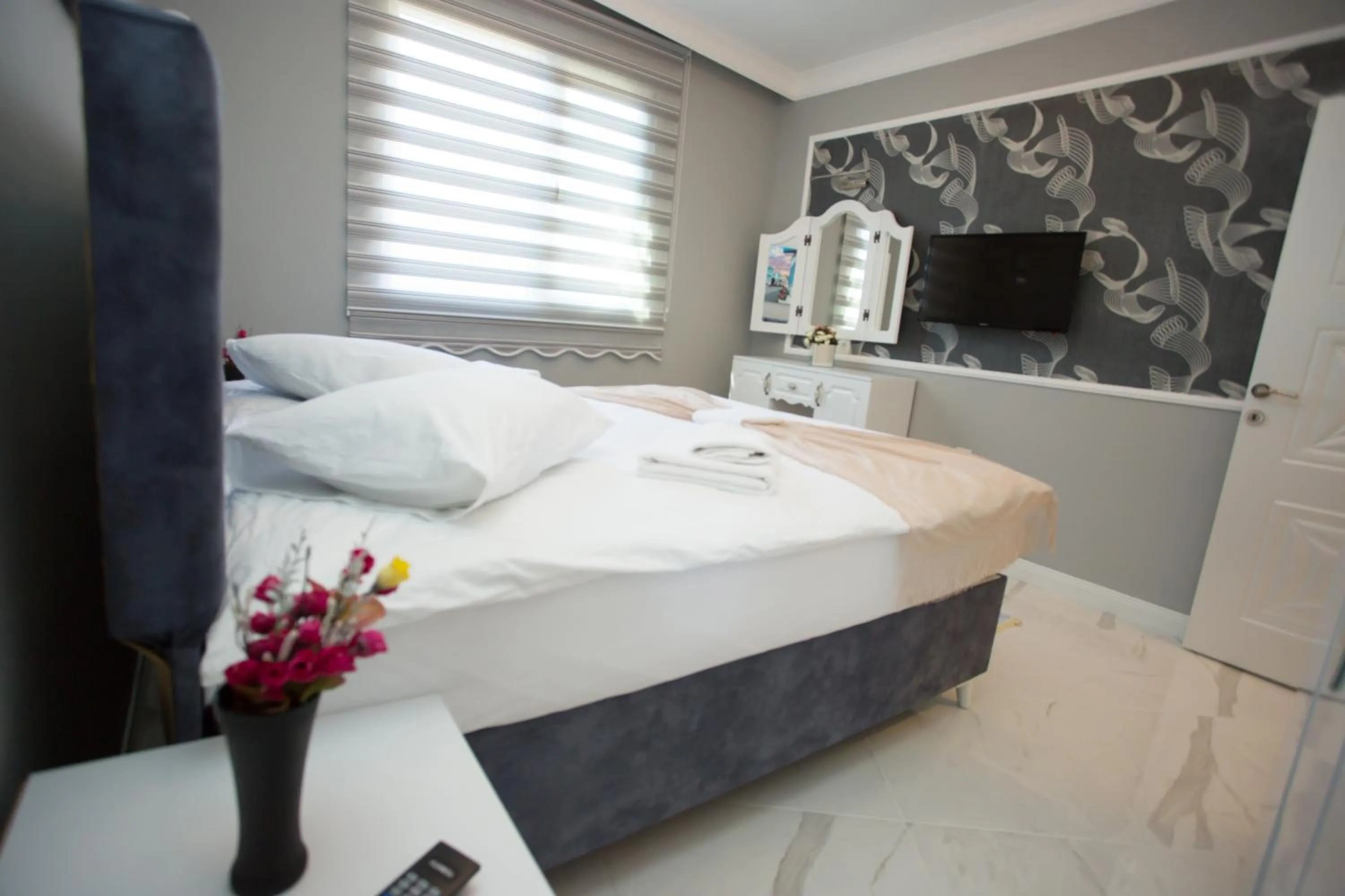 Bed in Little Palace Blue Apartment