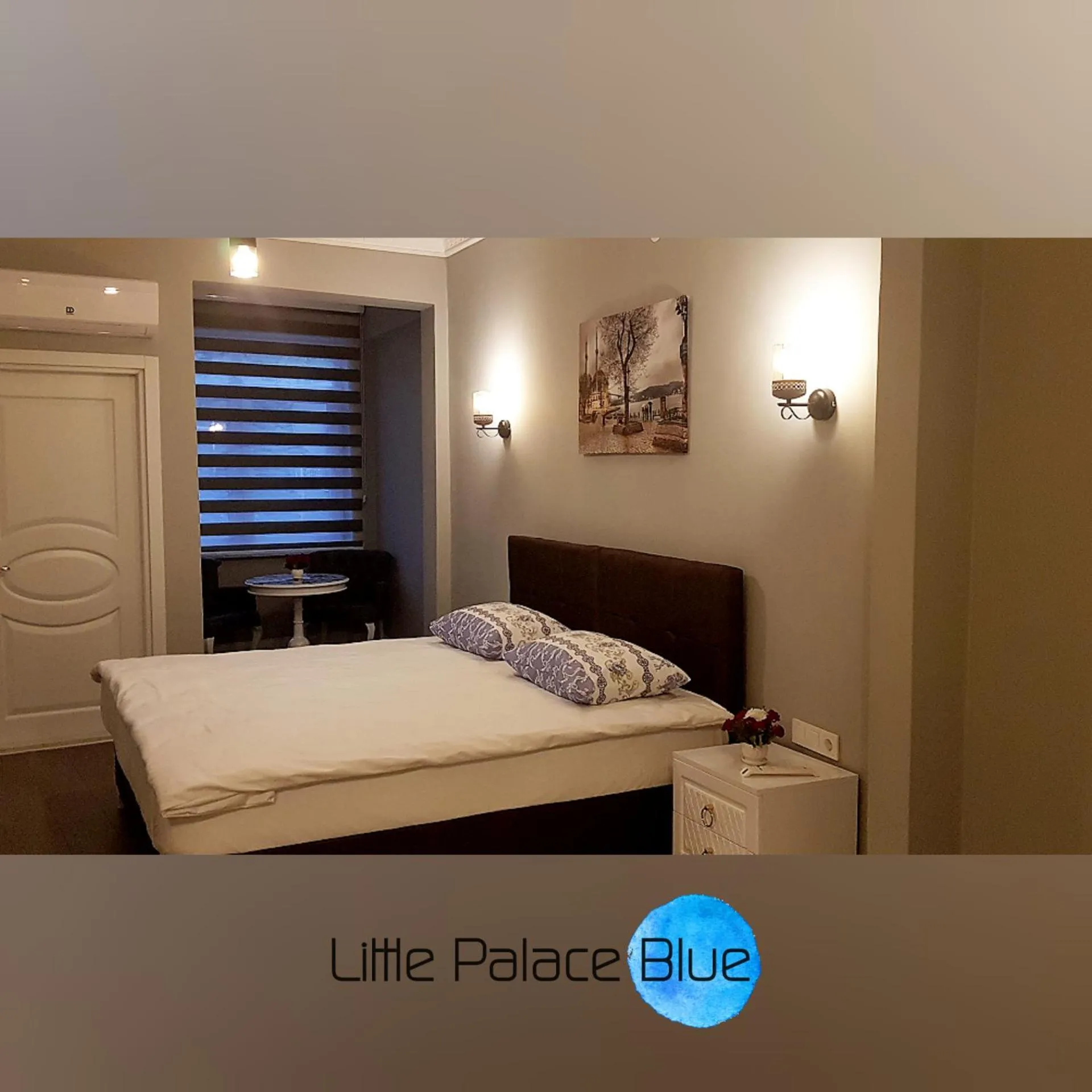 Bed in Little Palace Blue Apartment