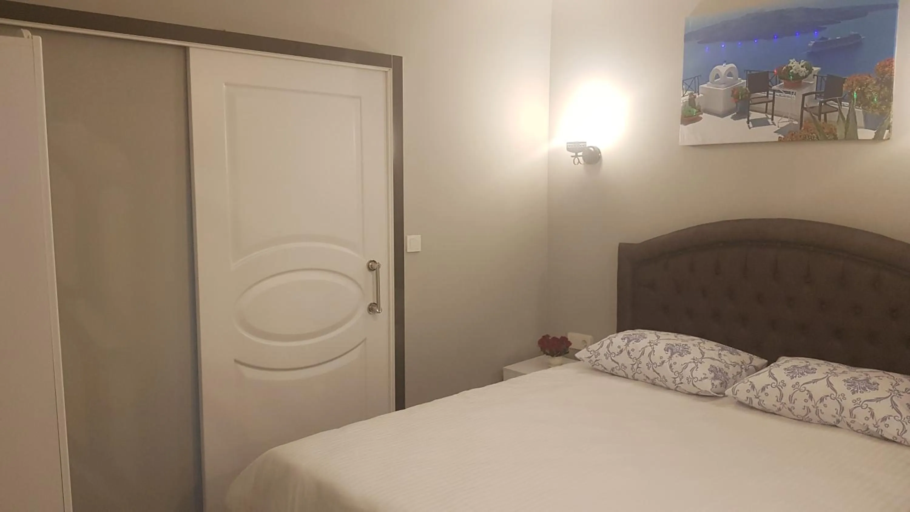 Bed in Little Palace Blue Apartment