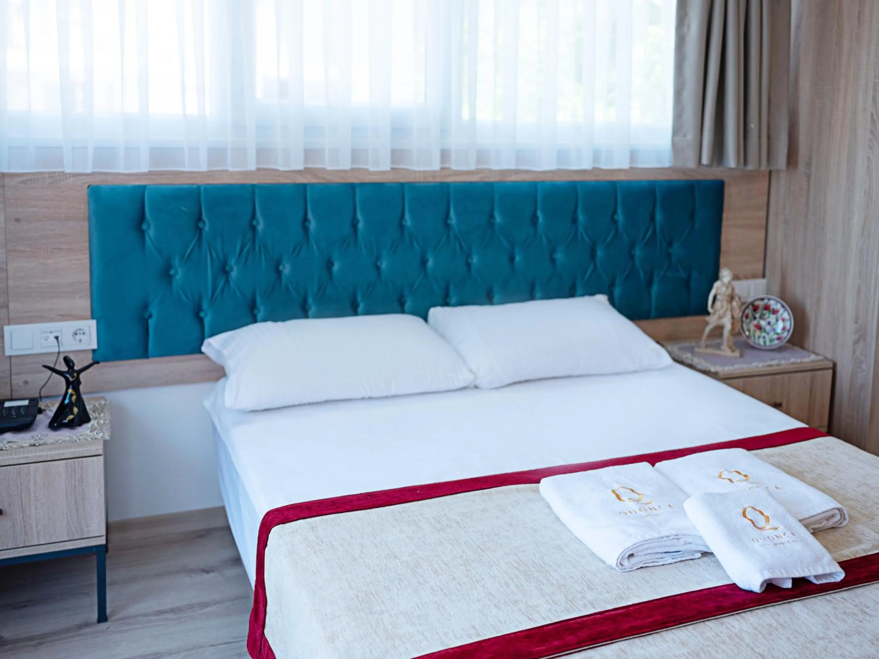 Bed in THE LAİLA HOTEL