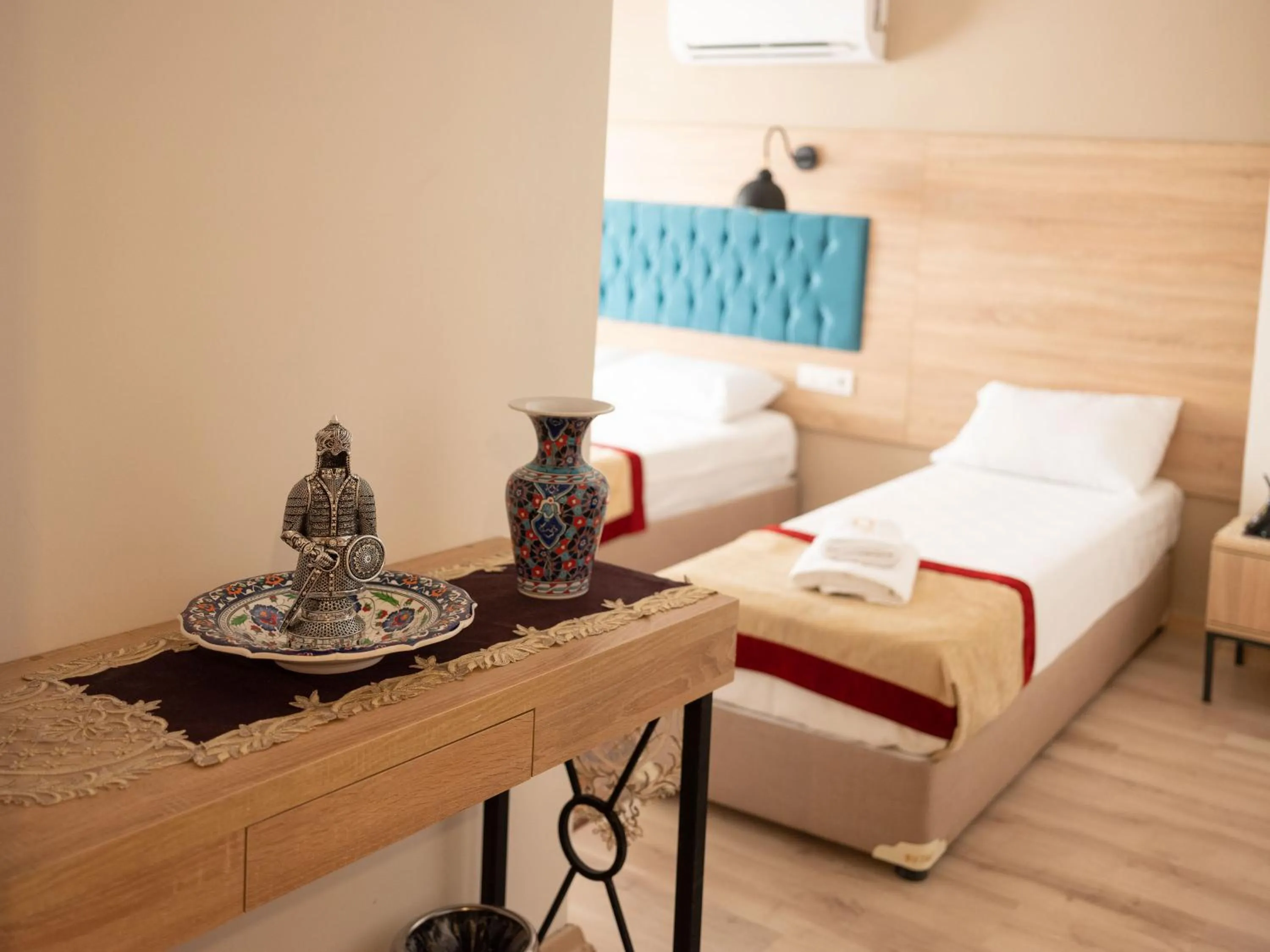 Bed in THE LAİLA HOTEL