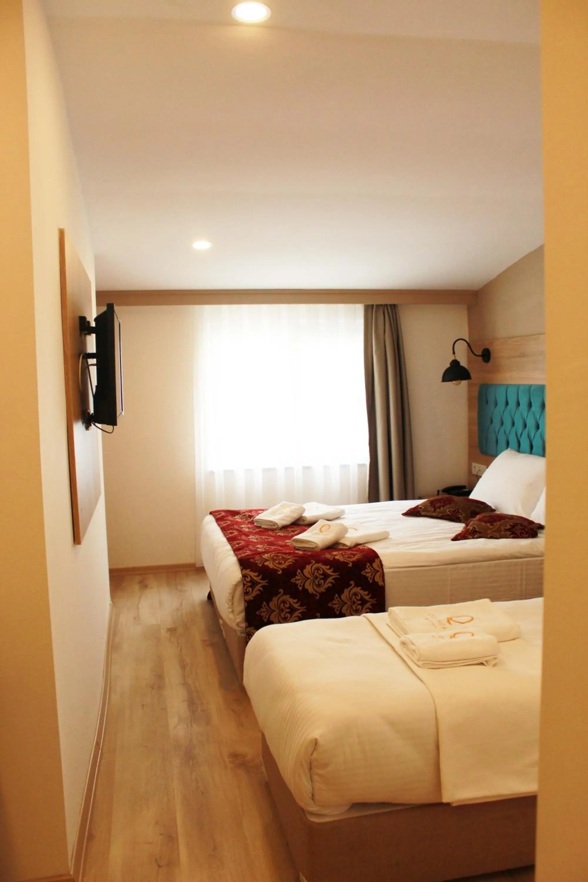 Bed in THE LAİLA HOTEL