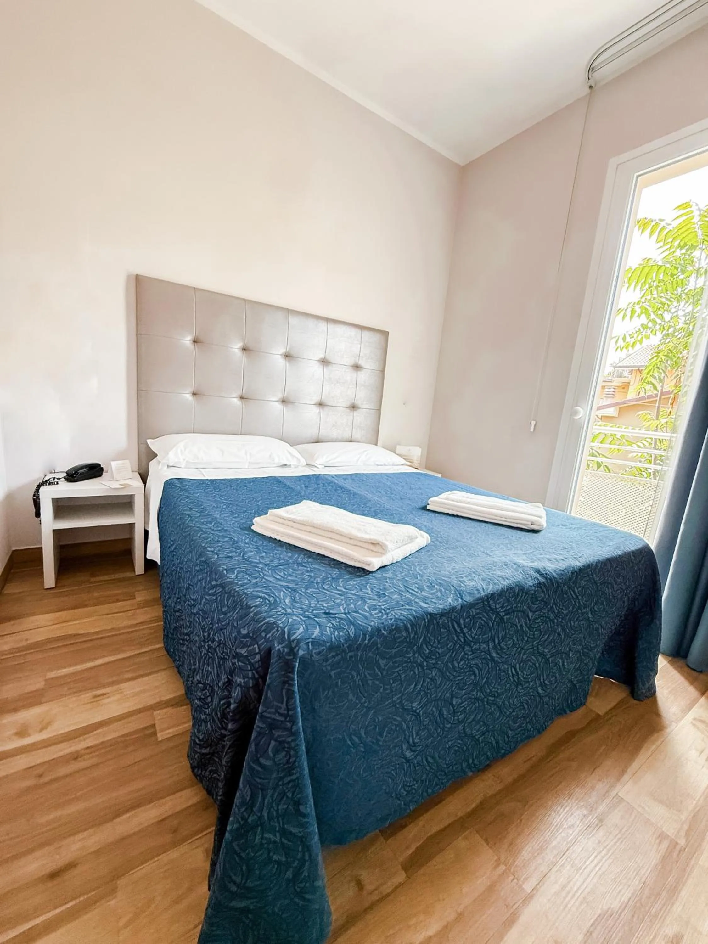 Bed in Hotel Bella Igea