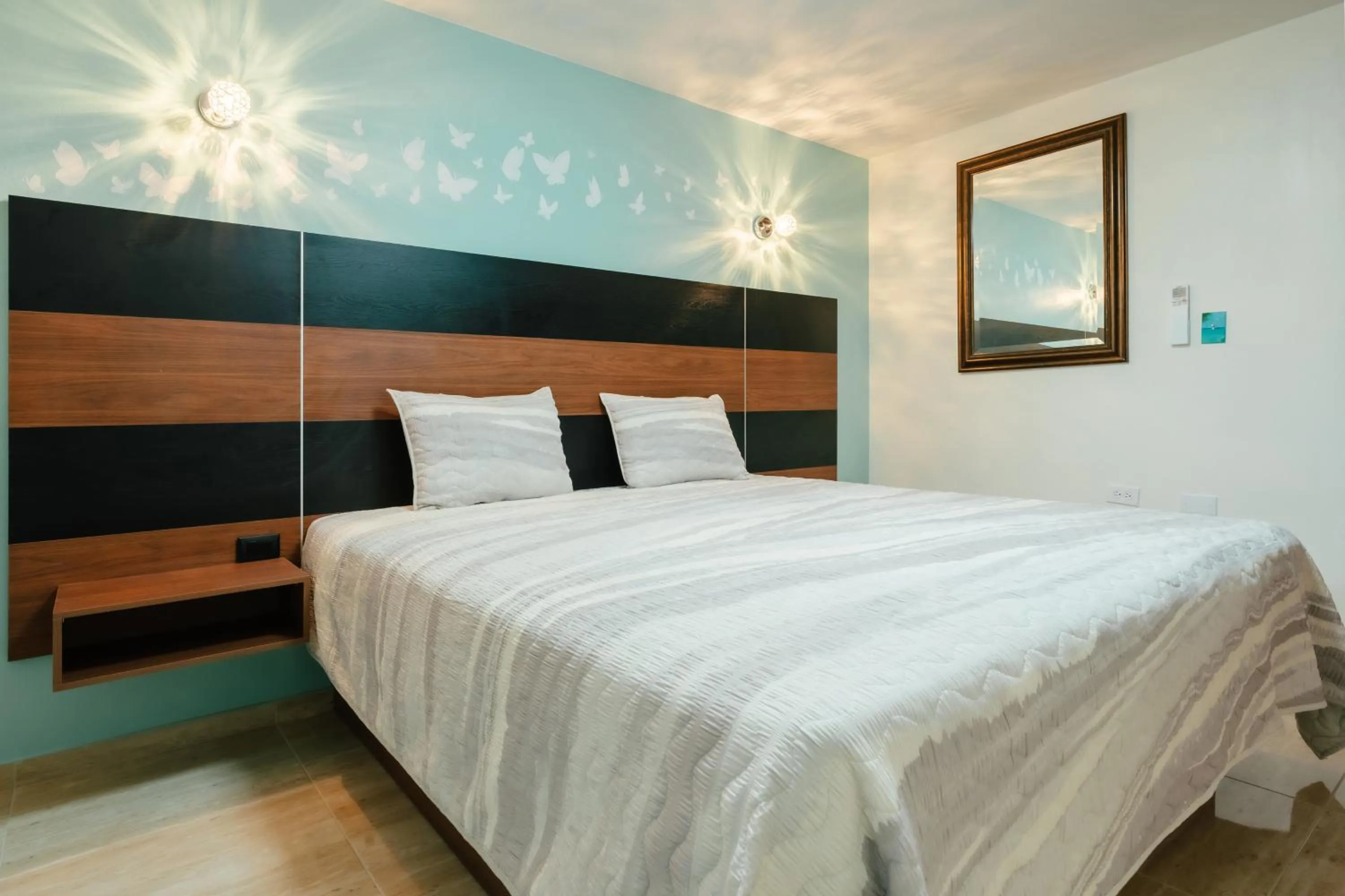 Bed in Hotel RH Boutique Aruba